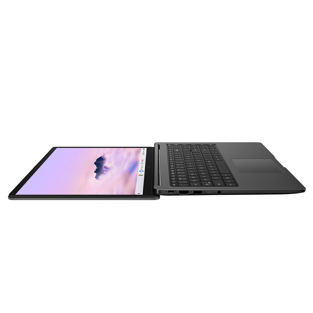 Portátil abierto, pantalla hacia arriba. Teclado visible. Pantalla muestra un paisaje nublado.