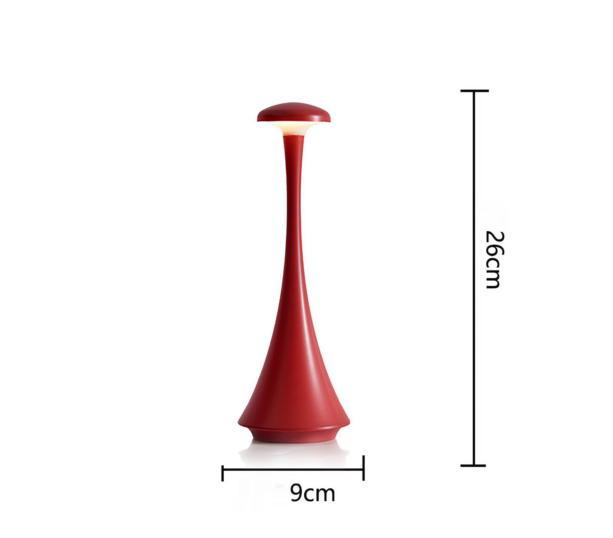Eine rote, moderne Lampe mit schlankem Hals und rundem Oberteil. Der Sockel ist breiter und die Lampe ist 26 cm hoch.