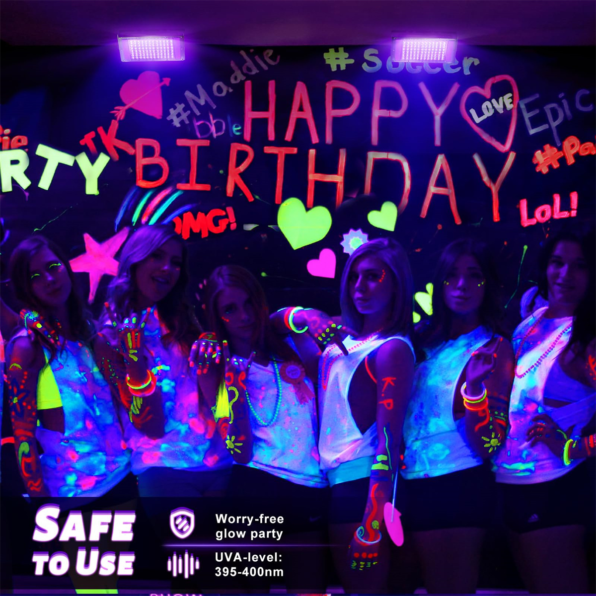 Eine Gruppe junger Frauen feiert eine Neon-Glow-Party in einem dunklen Raum mit leuchtenden Dekorationen.