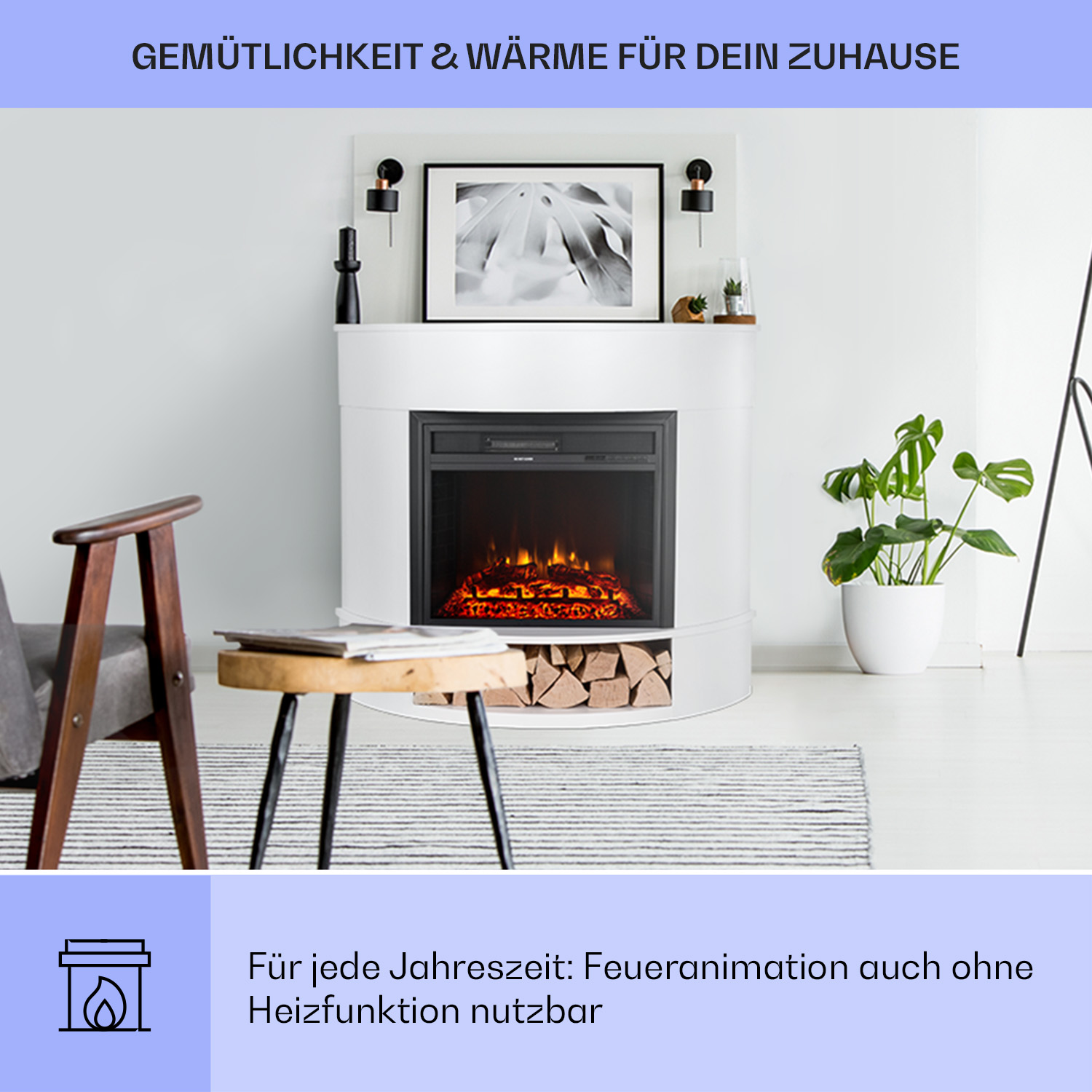 Ein moderner weißer Kamin mit schwarzem Innenraum. Davor ein Holztisch mit Stuhl und Pflanze.