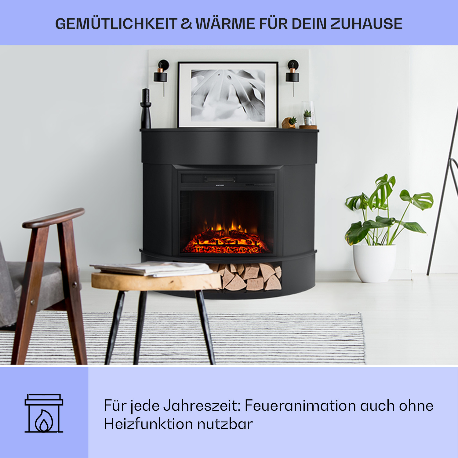 Ein schwarzer Elektrokamin mit Flammeneffekt, mit Pflanze und Möbeln.