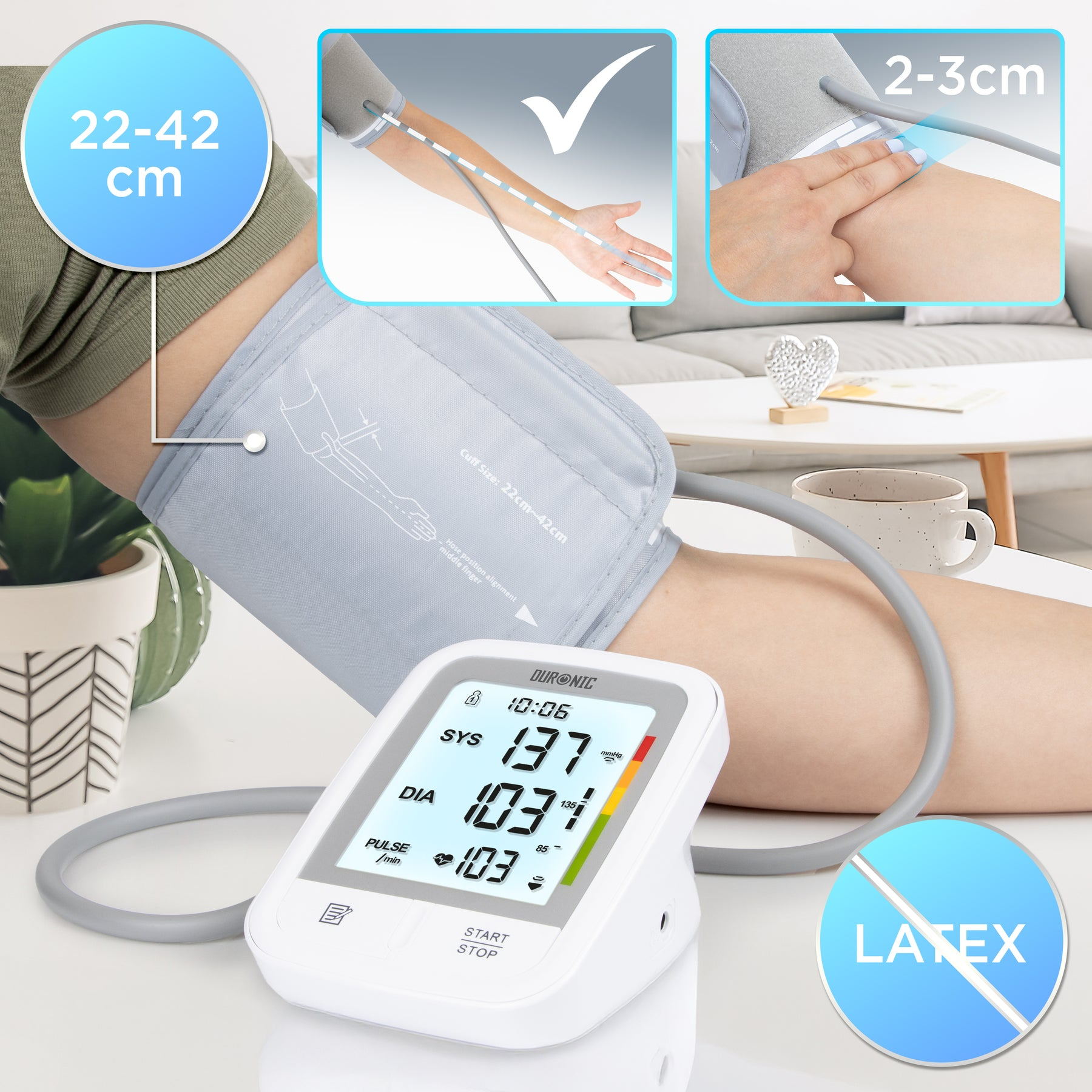 Ein Blutdruckmessgerät auf einem Tisch mit einer Manschette, die an einem Arm verwendet wird.