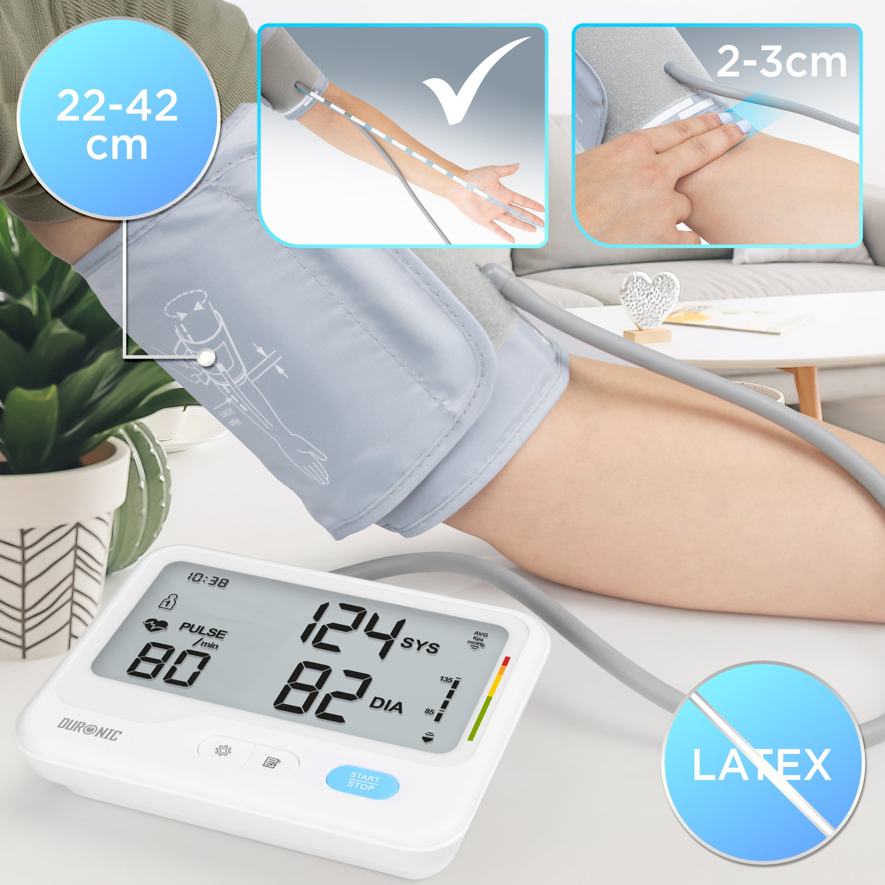 Eine Person mit einer Blutdruckmanschette am Arm. Ein Monitor zeigt die Messwerte an.