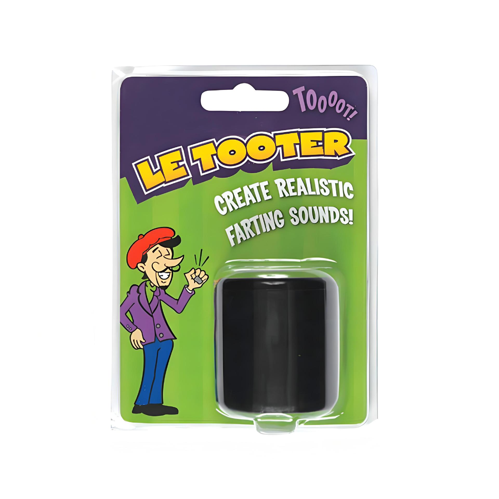 Ein verpacktes Spielzeug 'Le Tooter' mit einer Zeichentrickfigur. Es verspricht, realistische Furzgeräusche zu erzeugen.