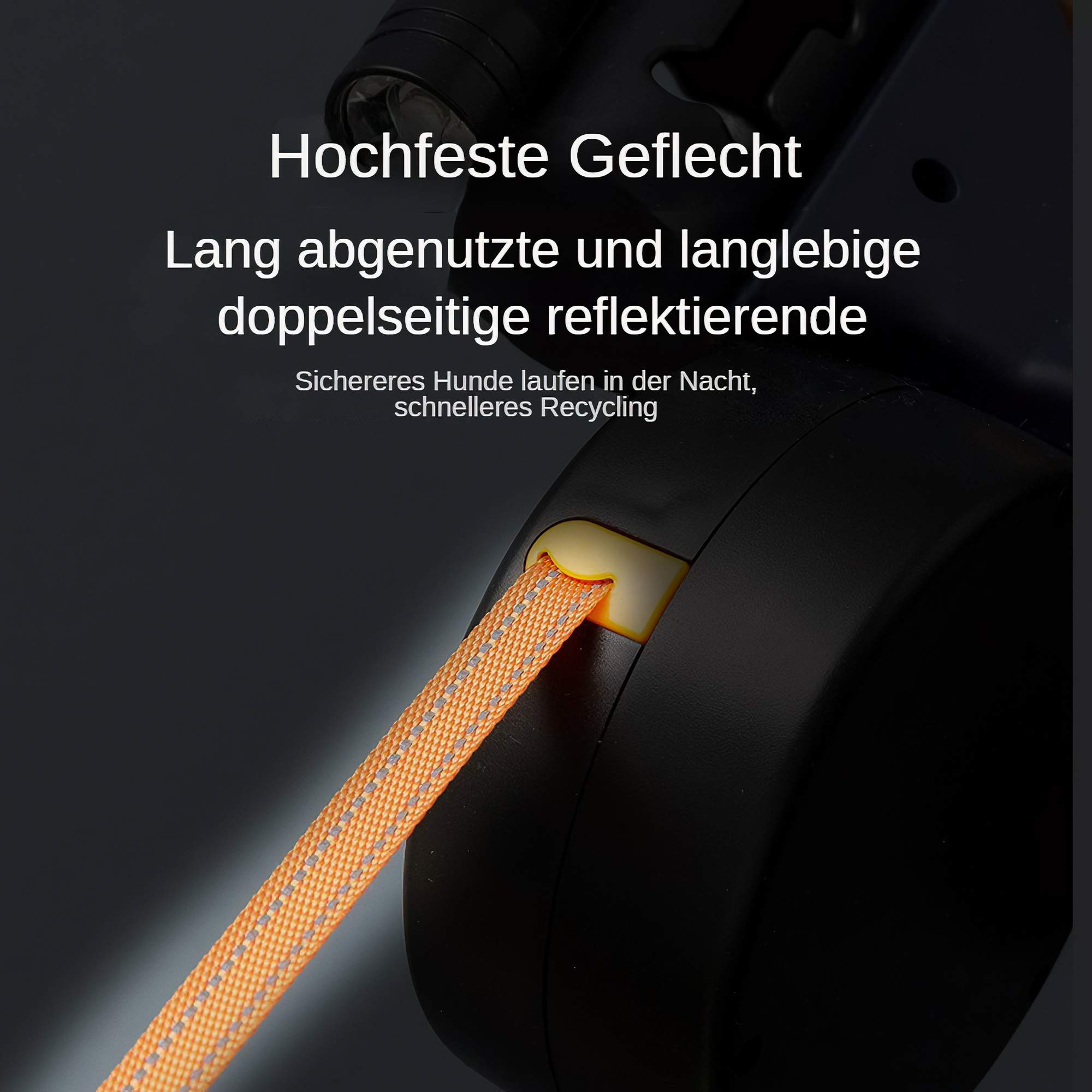 Nahaufnahme der Hundeleine. Sie hat eine orangefarbene reflektierende Leine und einen schwarzen Griff.