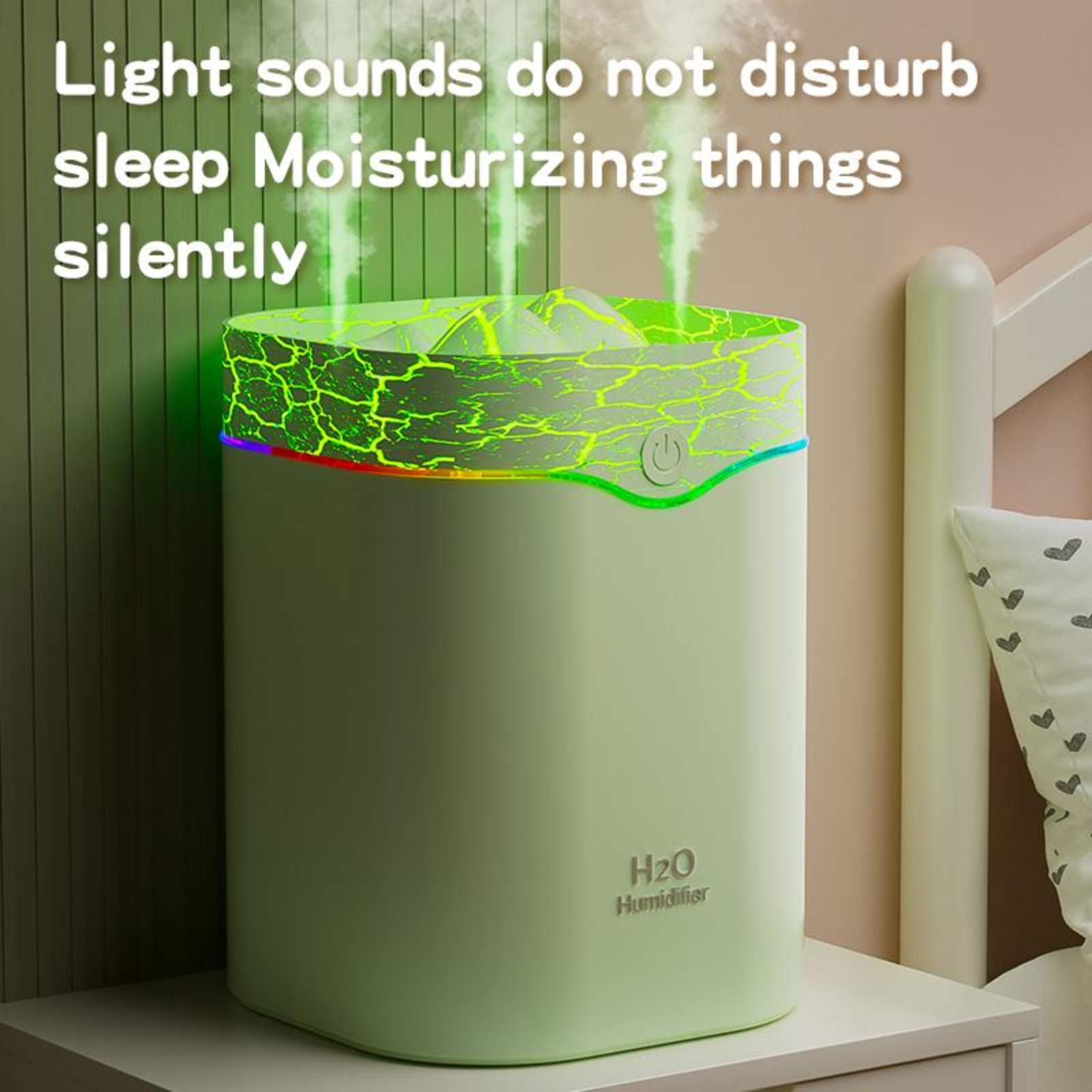 Ein hellgrüner Luftbefeuchter mit leuchtender Oberseite, der auf einem Nachttisch steht, Text lautet H2O Humidifier.