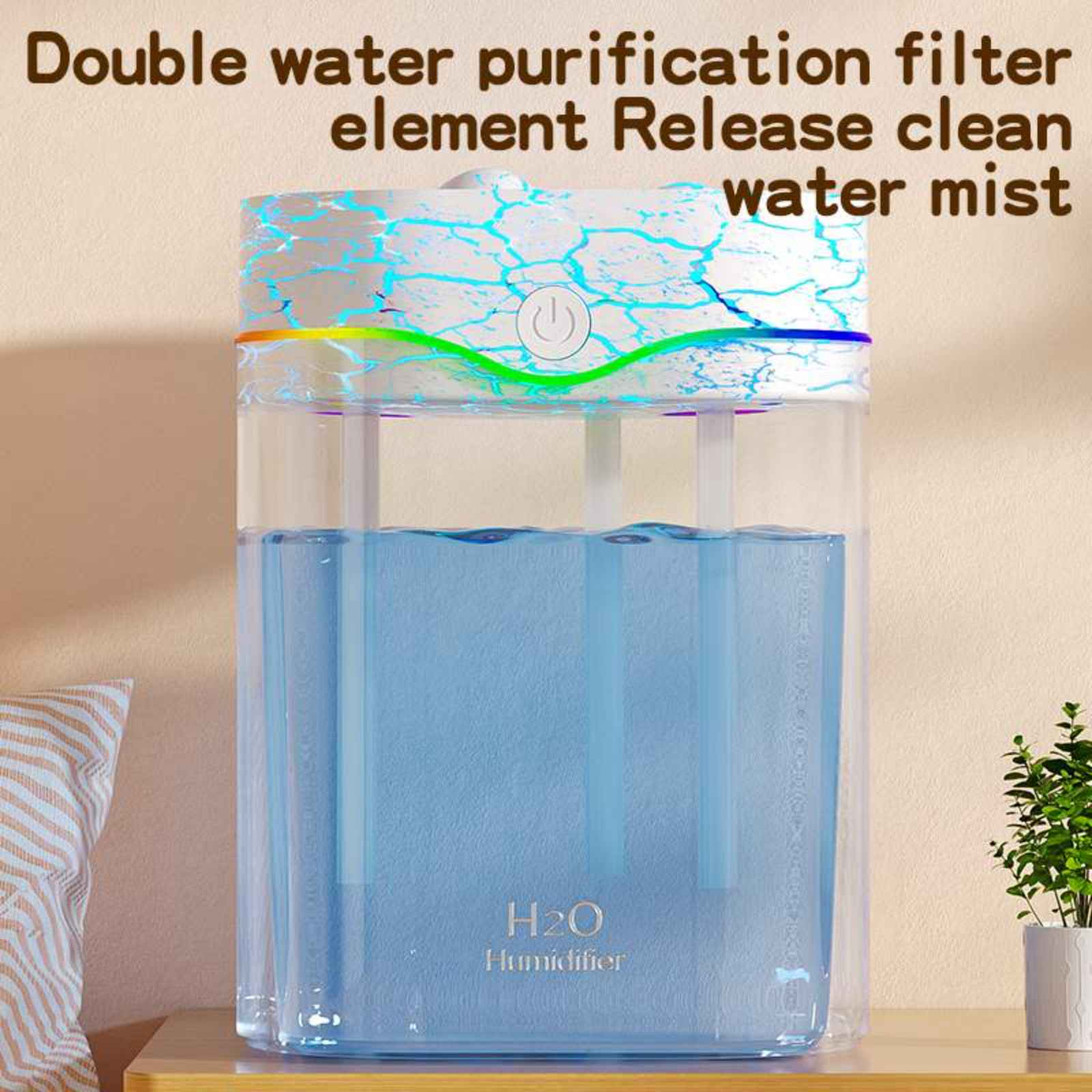 Transparenter Luftbefeuchter mit Wassertank. Die Oberseite hat Regenbogenlichter und ein Rissdesign.