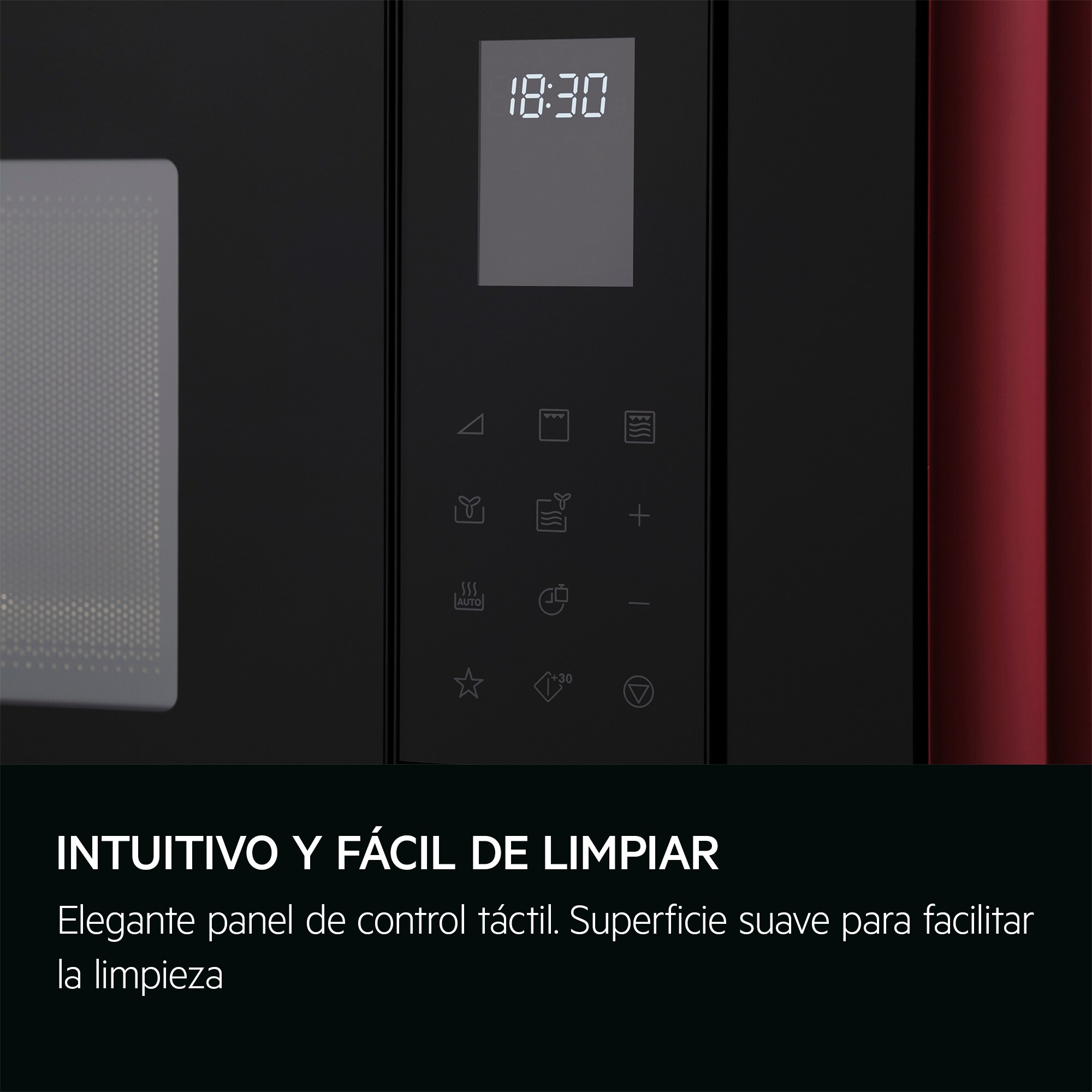 Czarny panel sterowania kuchenką mikrofalową z cyfrowym zegarem pokazującym 18:30. Poniżej tekst: 'Intuicyjny i łatwy do czyszczenia'.