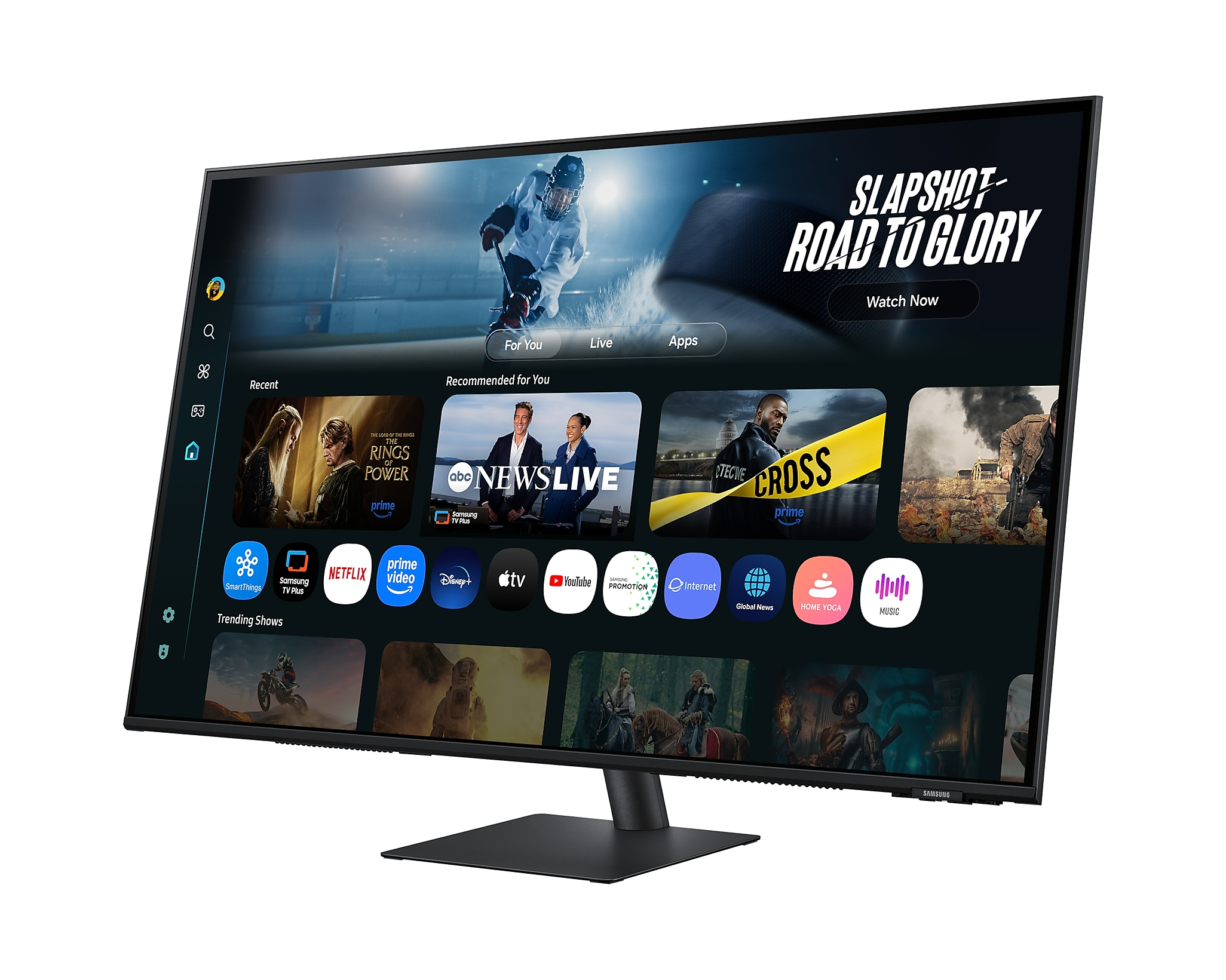 Monitor Samsung wyświetla scenę sportową. Na ekranie widoczne są ikony aplikacji i usług streamingowych. Czarny stojak.