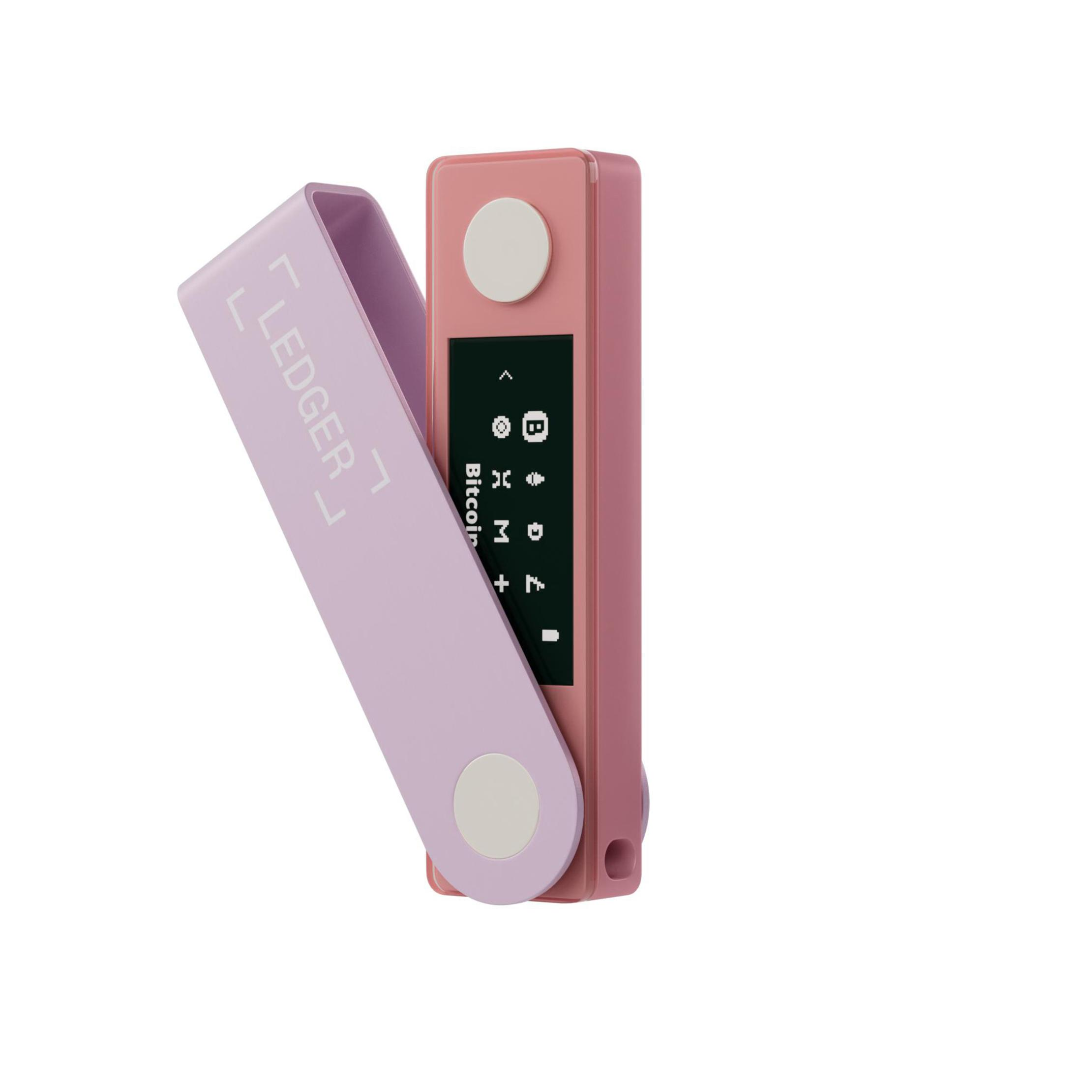 Una billetera de hardware de criptomonedas Ledger Nano S Plus rosa está abierta, mostrando una transacción Bitcoin.