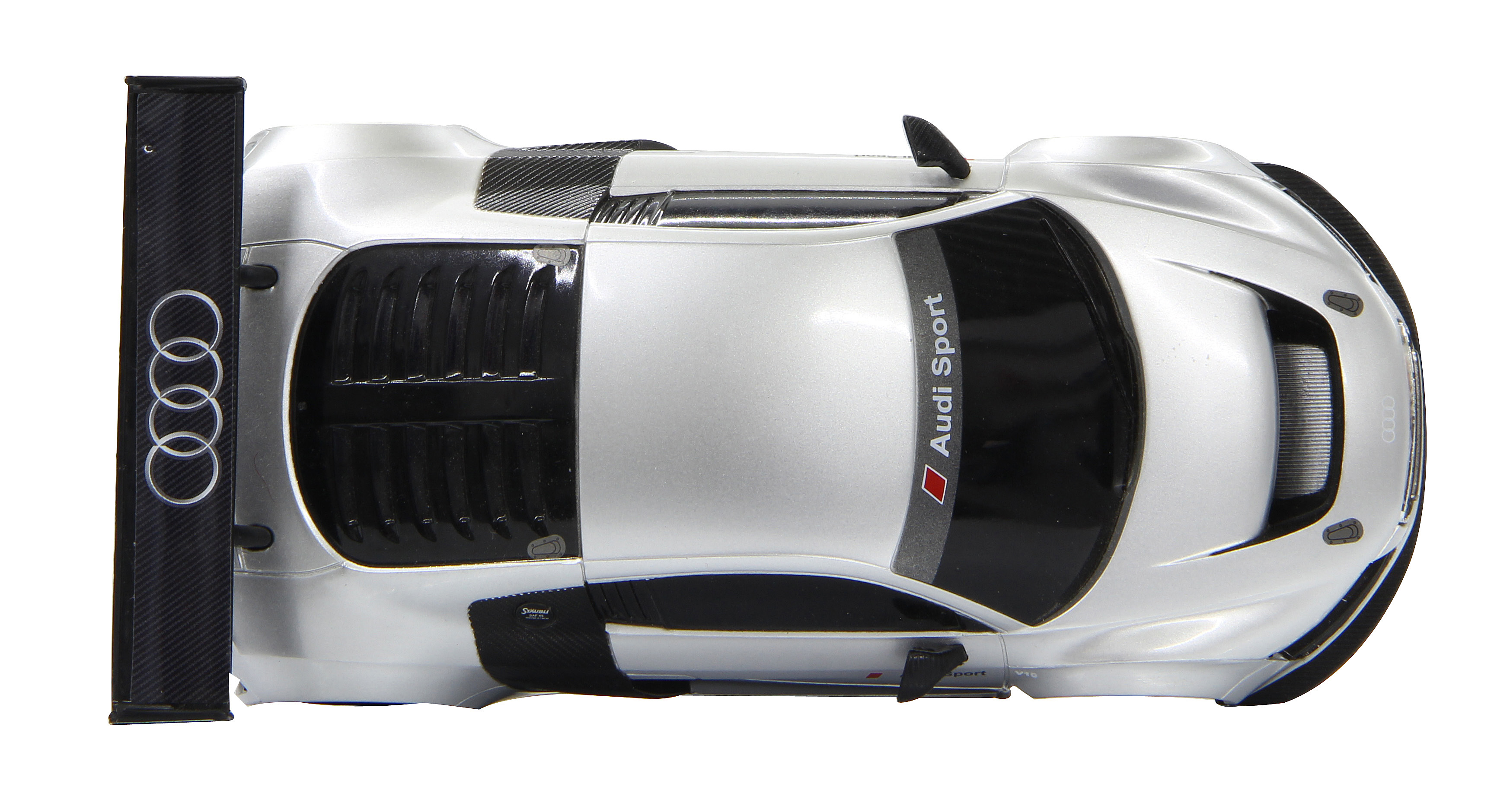 Srebrny model samochodu wyścigowego Audi z góry, na białym tle z czarnymi detalami.