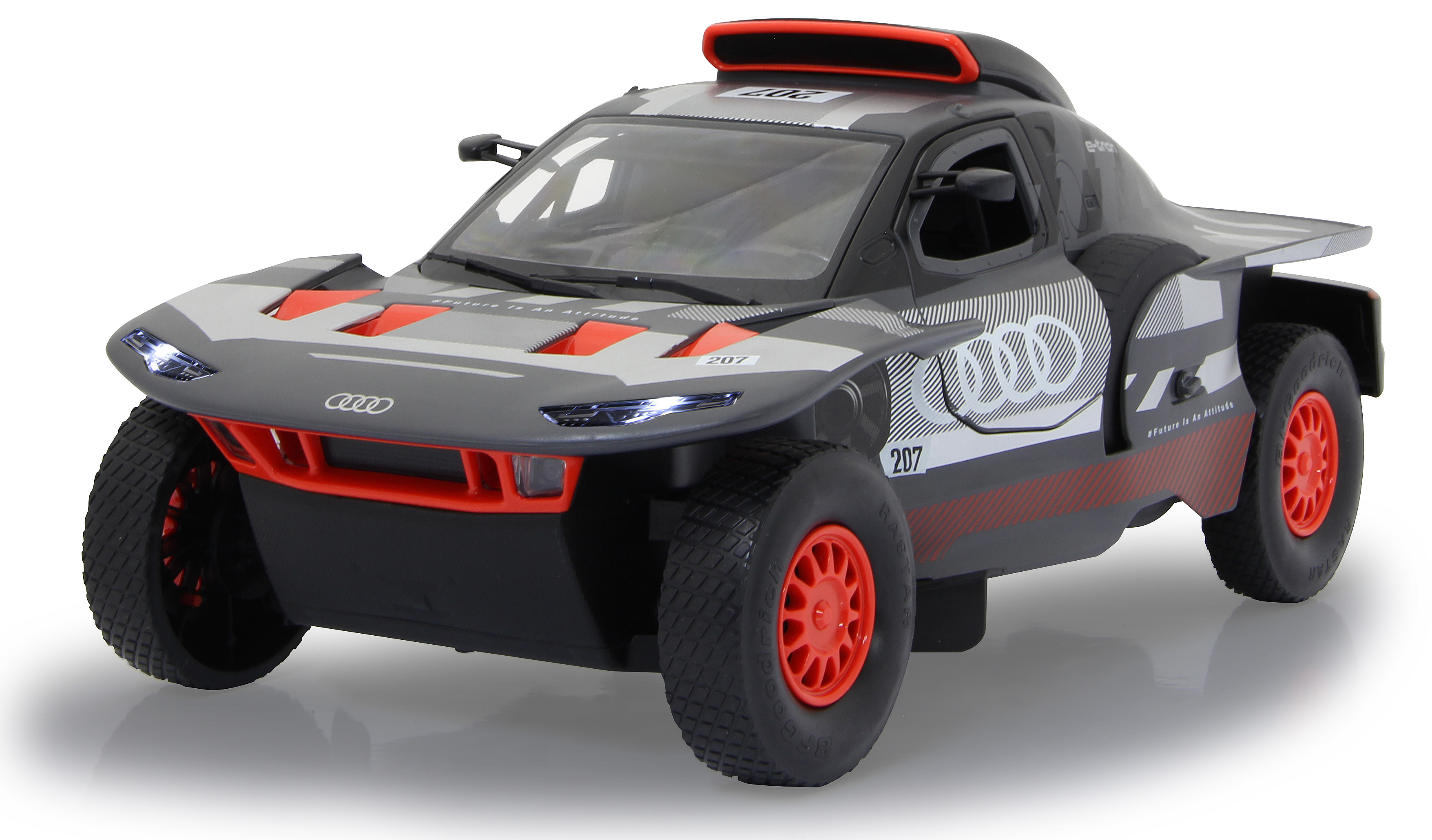 Graues Audi Rallye-Automodell mit roten Akzenten, schwarzen Rädern, weißer Hintergrund.