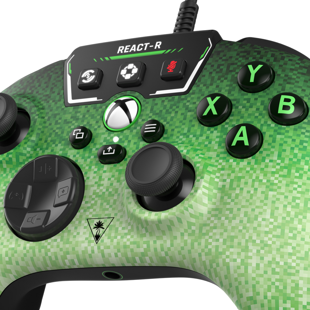 Green and black Xbox controller with buttons labeled Y, X, B, A, and a directional pad.