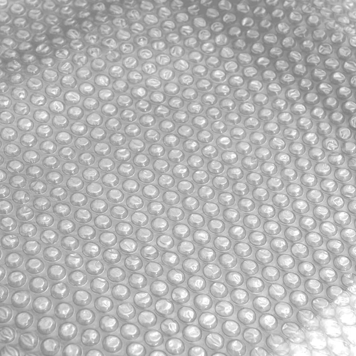 Nahaufnahme eines grauen, blasenartigen Materials.