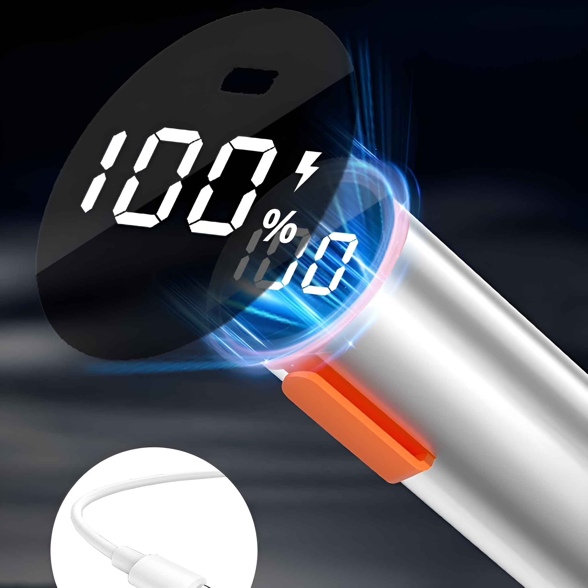 Eine digitale Anzeige mit 100% Akku. Ein weißes Ladekabel ist angeschlossen. Das Produkt ist silber und orange.
