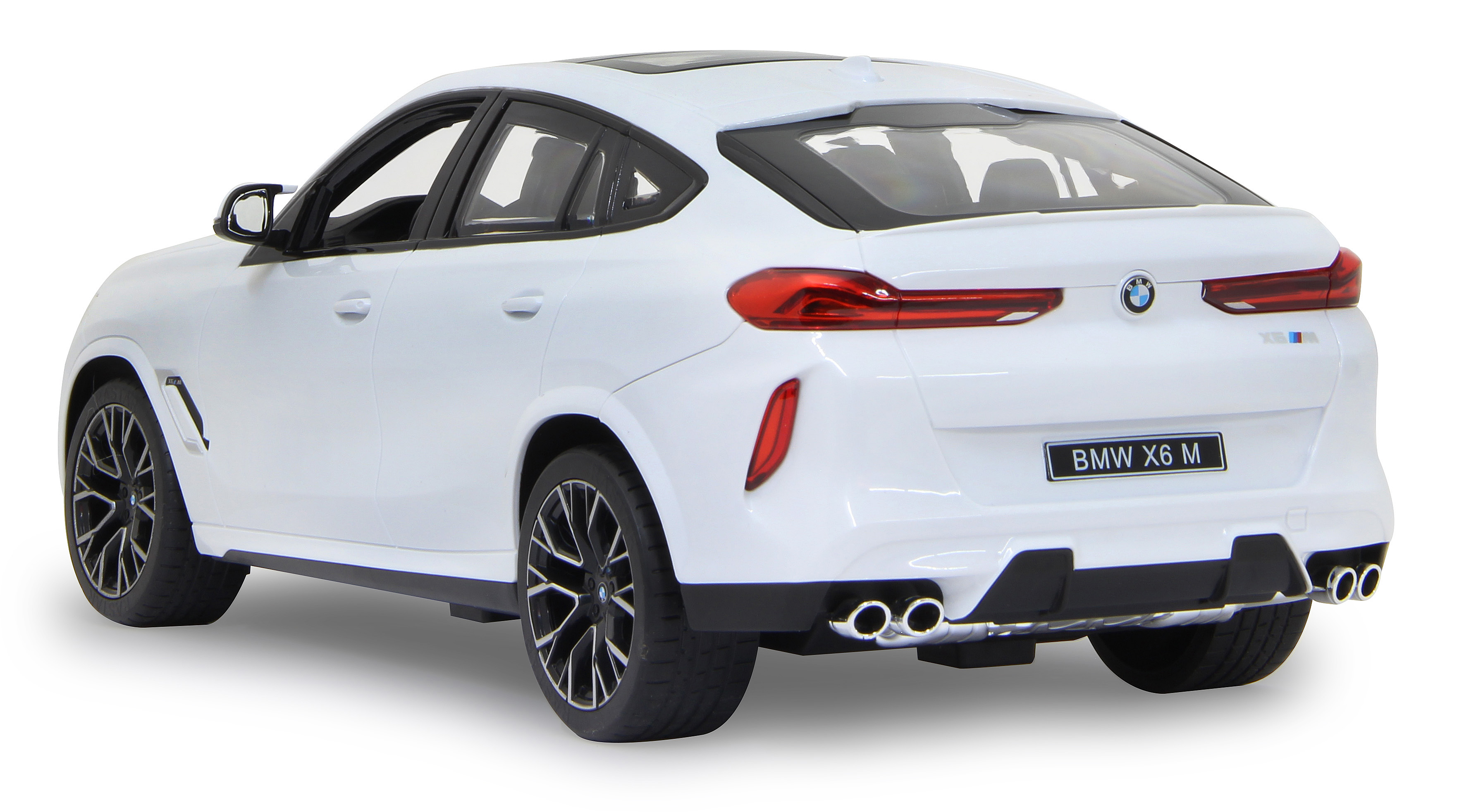 Weißes BMW X6 M Spielzeugauto. Rückansicht. Das Auto hat schwarze Räder und schwarze Akzente. Die Rücklichter sind rot.