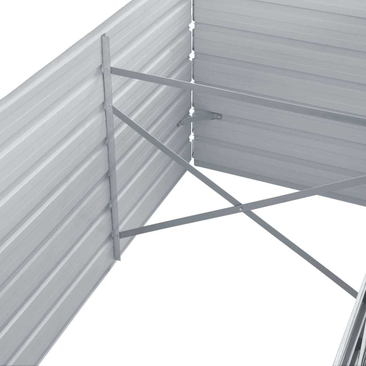 Eine Nahaufnahme des Inneren eines Metallpflanzgefäßes. Es zeigt abgewinkelte Stützbalken und gewellte Metallverkleidung.