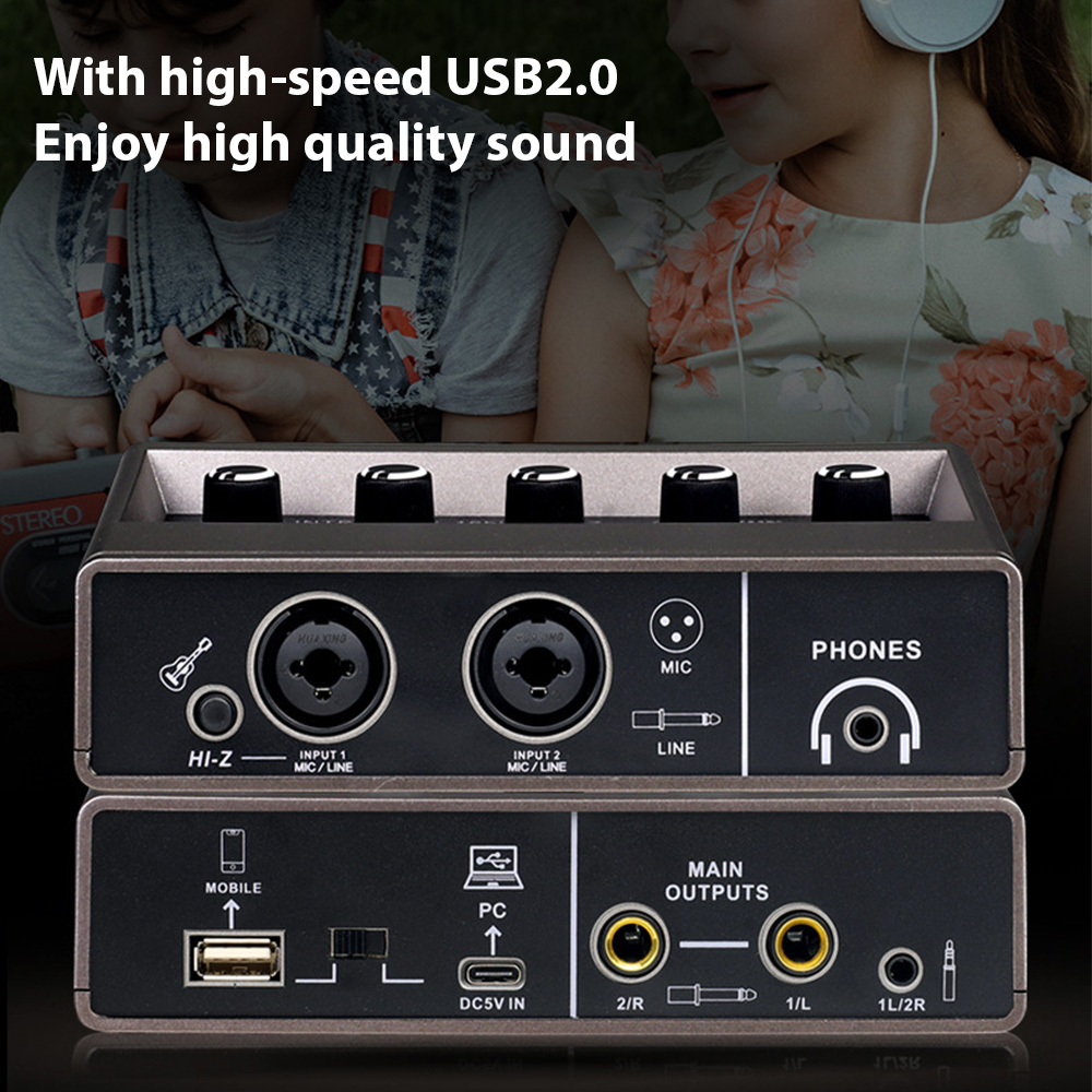 Audio-Interface mit Knöpfen und Eingängen. Zwei Kinder sind im Hintergrund.