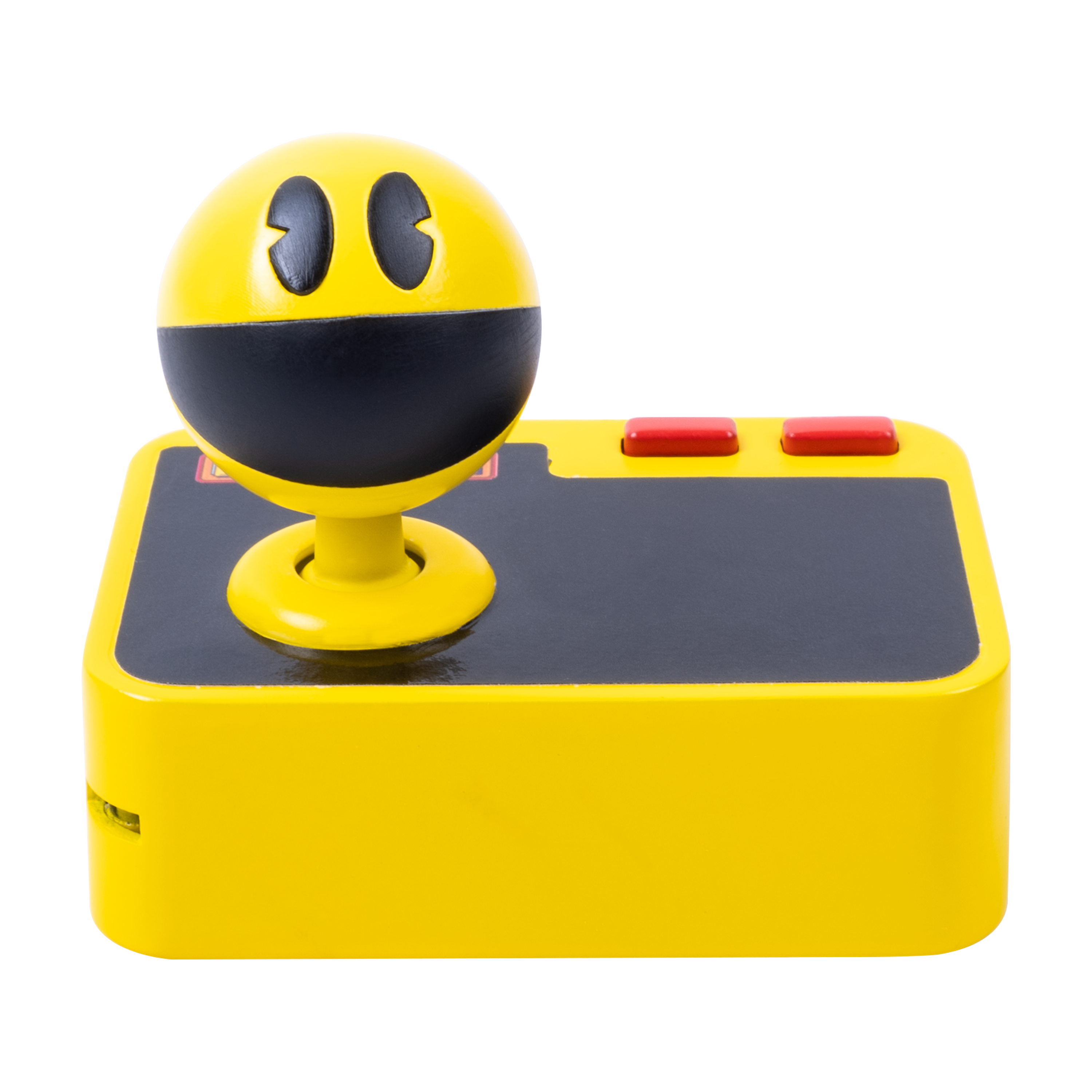 Een gele Pac-Man joystick. Het staat op een zwart oppervlak, met rode knoppen.