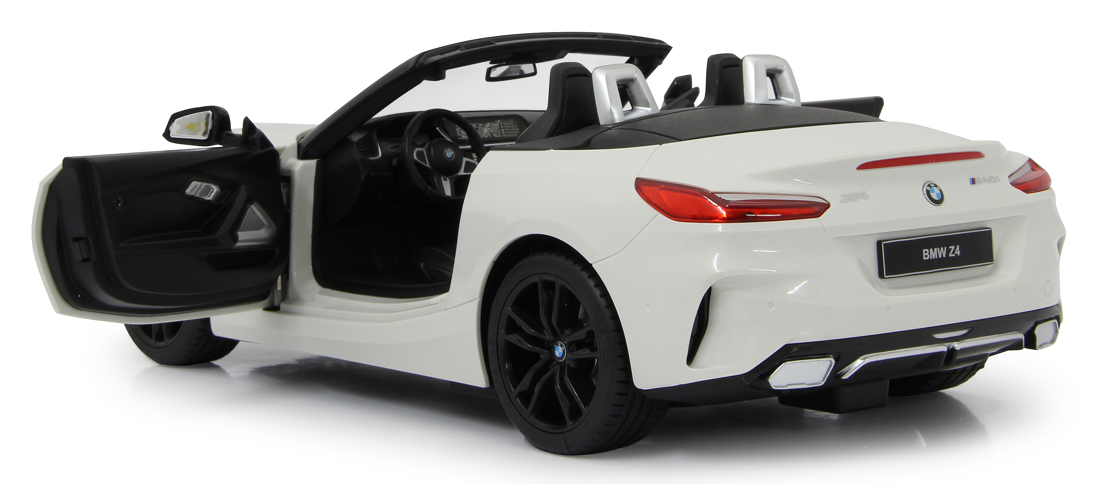 Weißes BMW Z4 Spielzeugauto, Rückansicht, mit offener Tür.