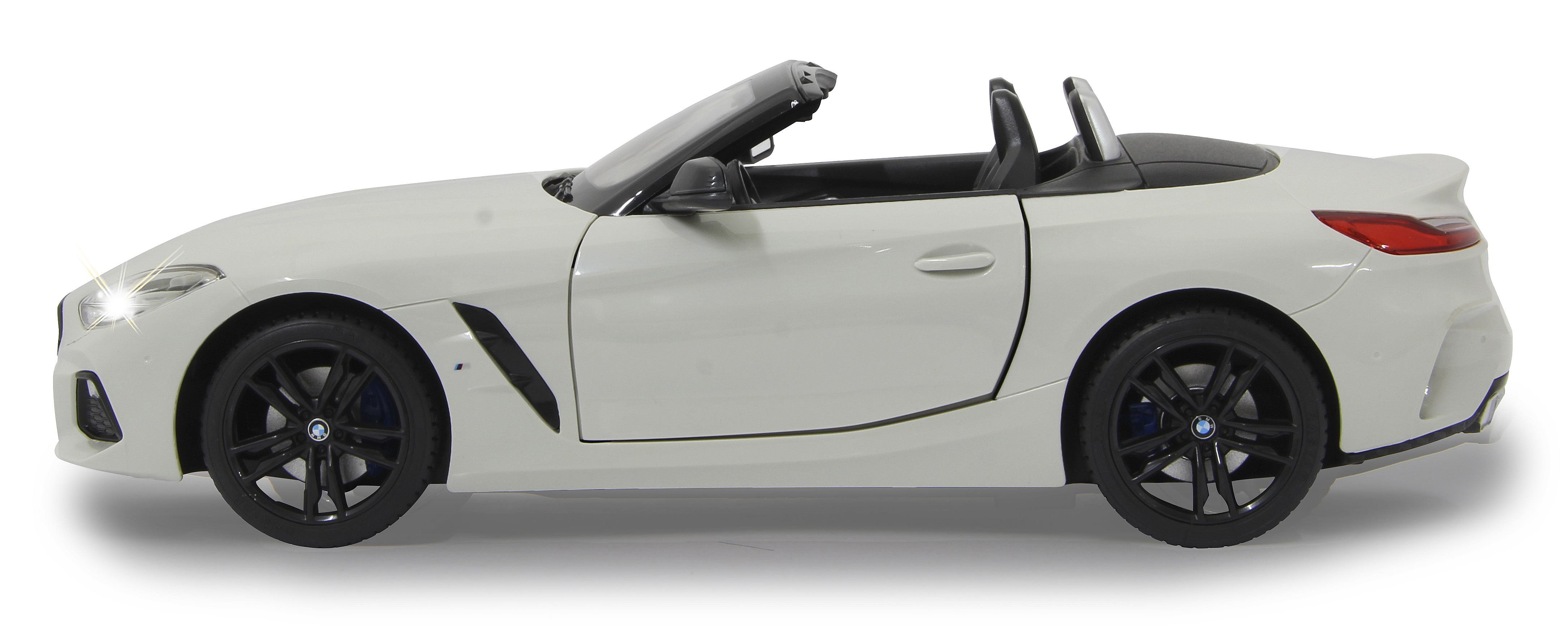 Weißes BMW Z4 Cabrio-Automodell. Seitenansicht auf weißem Hintergrund.
