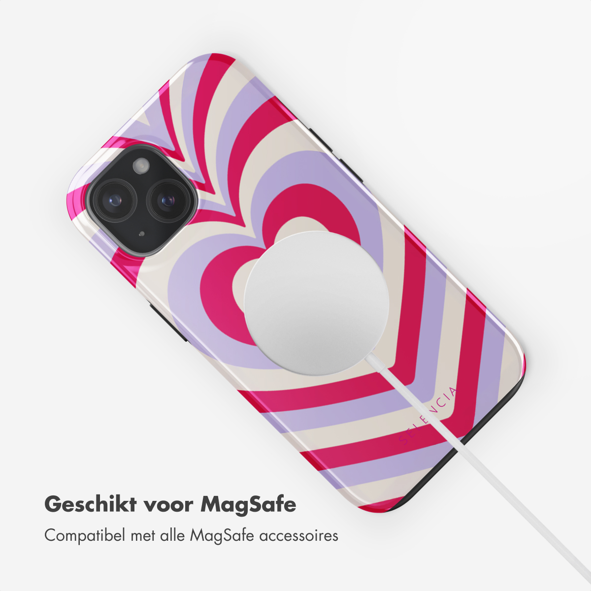 Telefoonhoesje met een hartontwerp en een witte MagSafe-lader. Tekst: Geschikt voor MagSafe.
