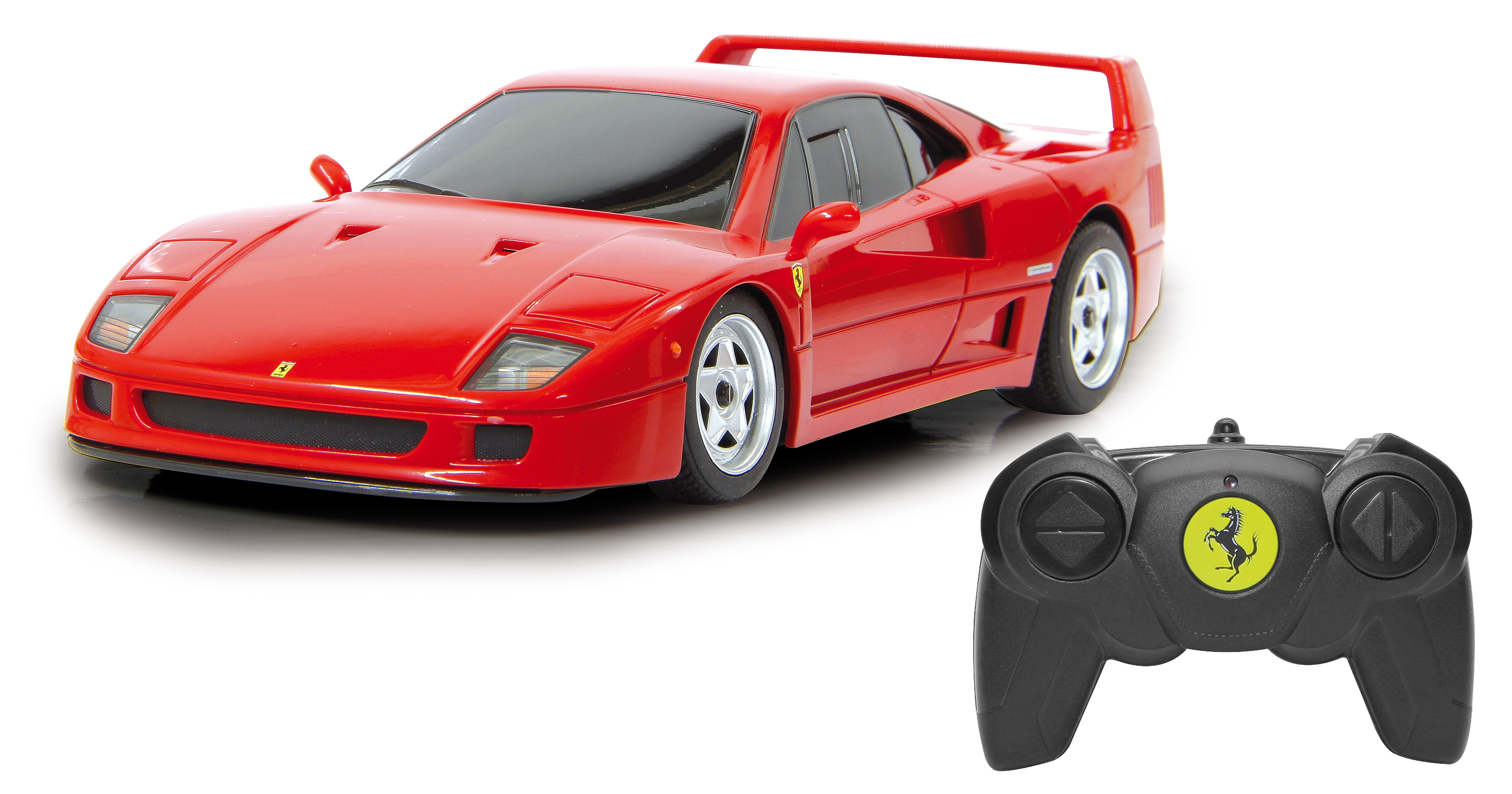Rotes Ferrari F40 Spielzeugauto und schwarze Fernbedienung auf weißem Hintergrund. Auto vorne, Controller rechts.
