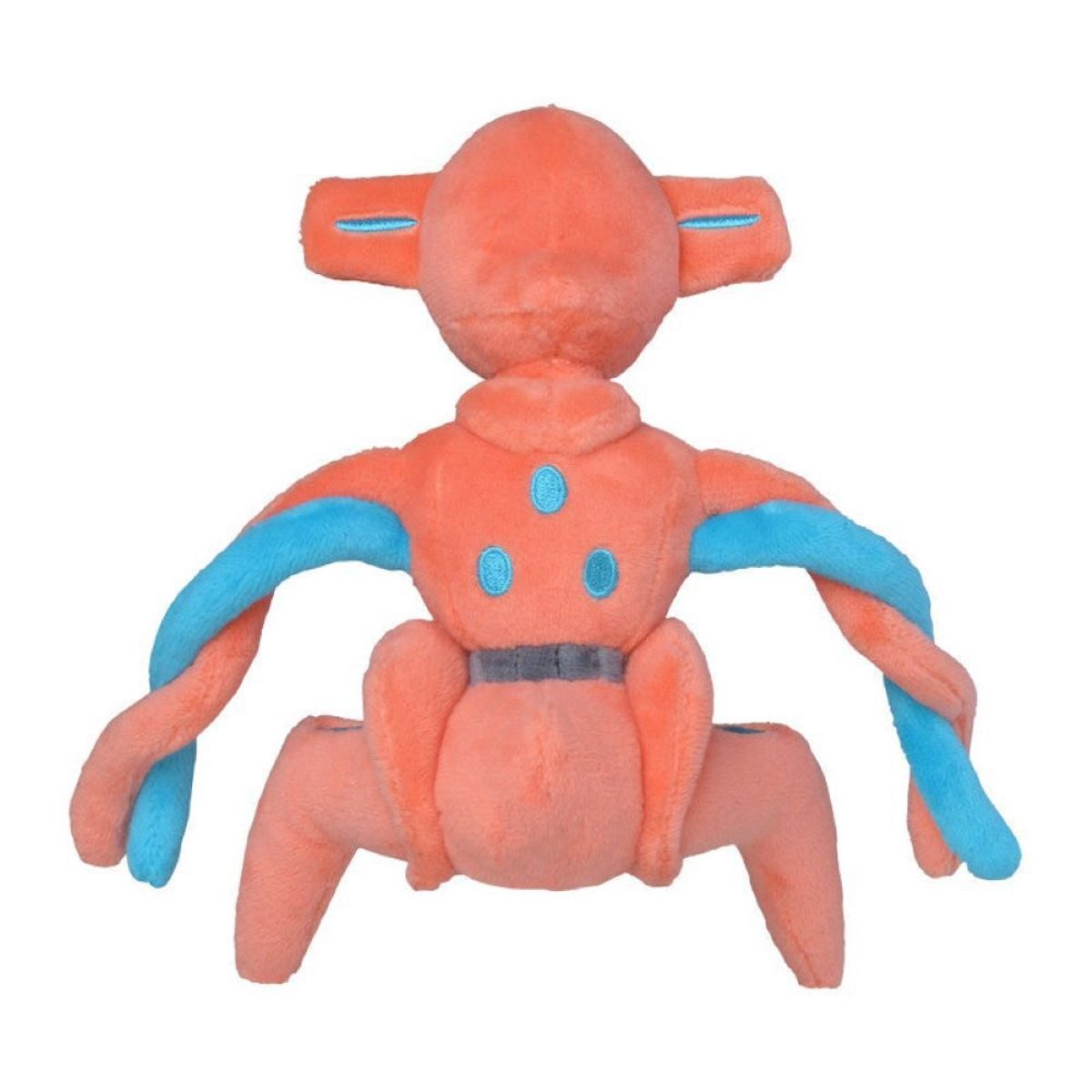 Ein Plüschtier einer orangefarbenen Kreatur mit blauen Armen und Beinen, einem grauen Gürtel und drei blauen Punkten auf der Brust.