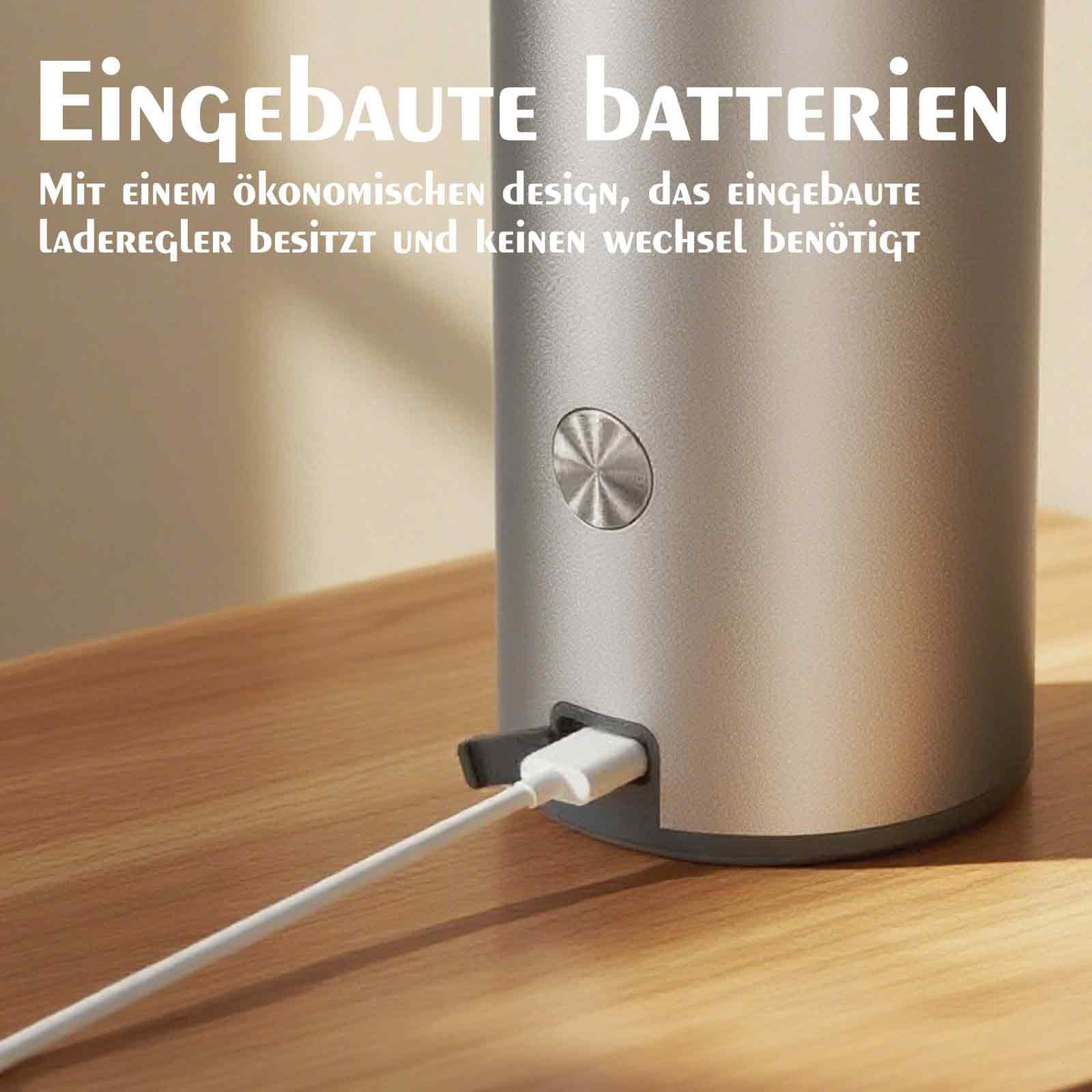 Nahaufnahme eines silbernen Geräts mit Ladeanschluss, verbunden mit einem weißen Kabel.