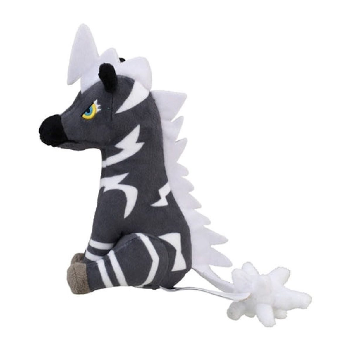 Ein Plüschtier-Zebra, schwarz und weiß mit weißer Mähne. Es sitzt auf weißem Untergrund.