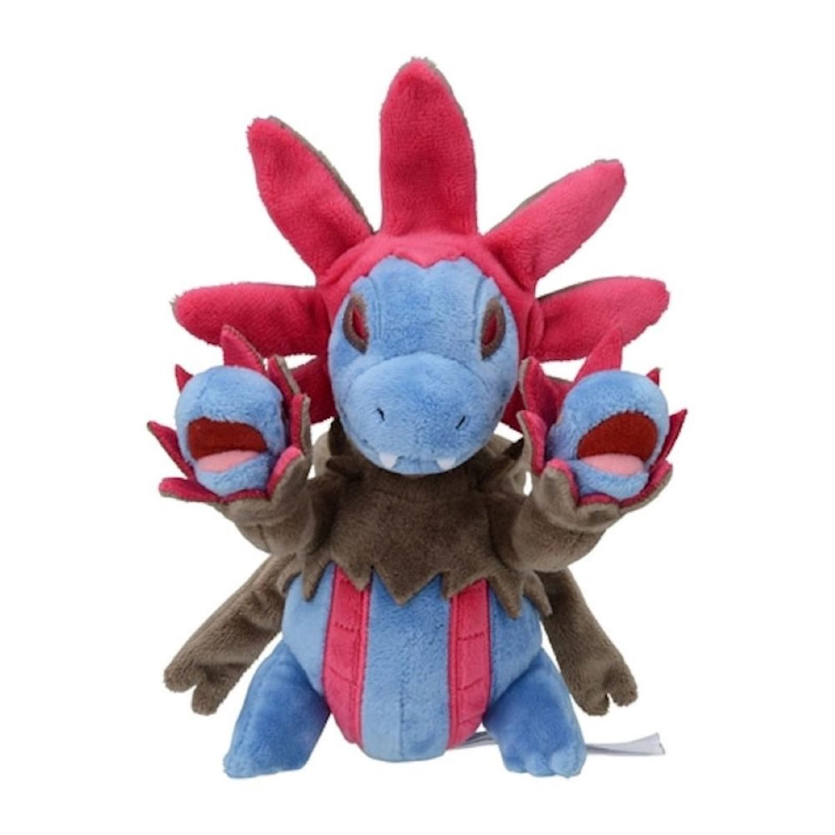 Ein Plüschtier eines blau-braunen Monsters mit rosa Streifen, roten Kopfspitzen und kleinen Armen. Es hat ein Etikett.
