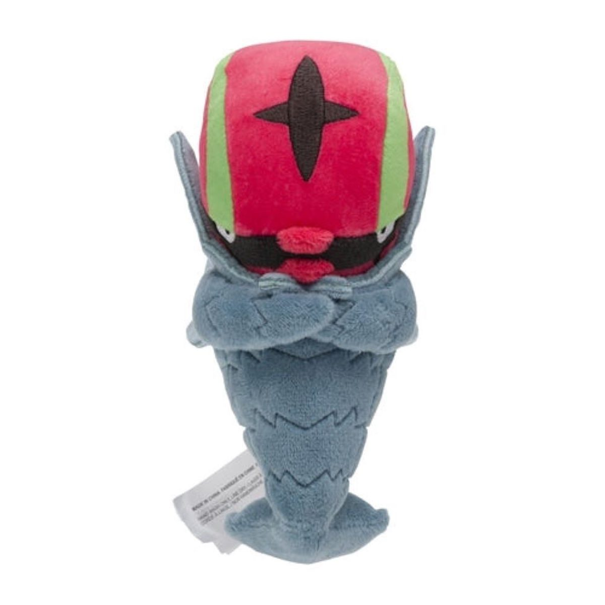 Ein rotes, schwarzes und grünes Plüschtier-Pokémon mit einem blauen, kegelförmigen Körper. Es hat verschränkte Arme.