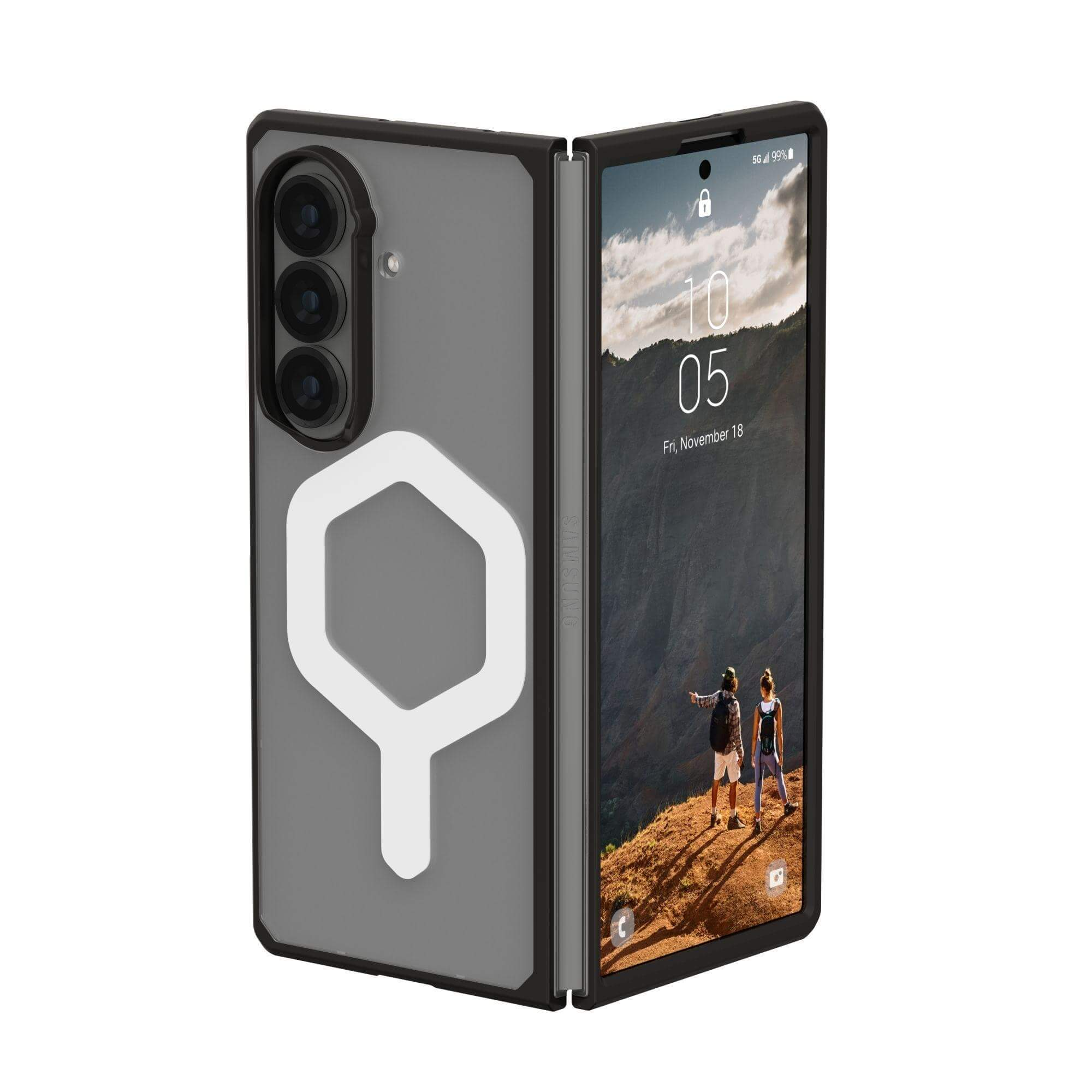 Un smartphone ouvert, cadre noir et dos gris, un accessoire hexagonal blanc est fixé à l'arrière du téléphone.