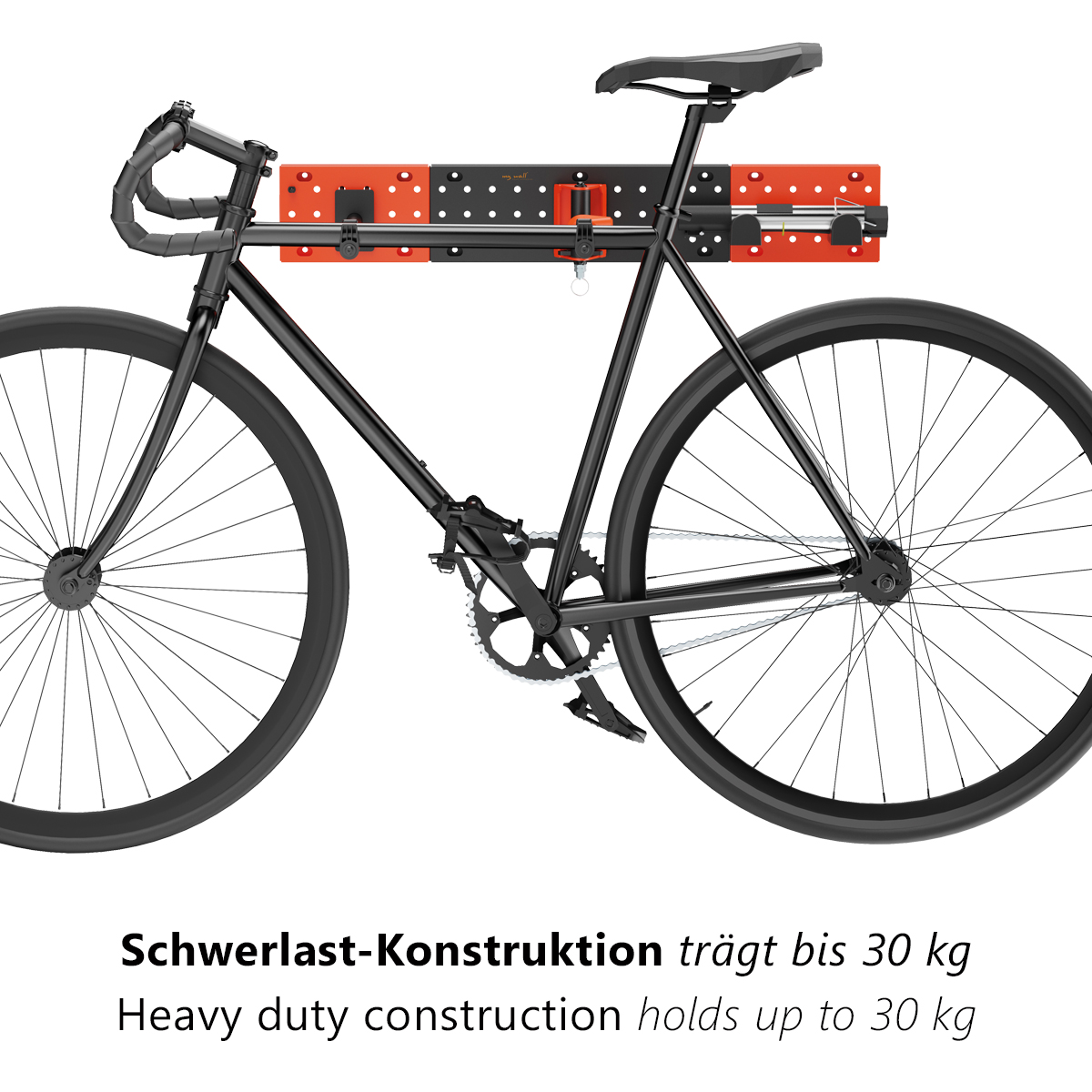 Schwarzes Fahrrad an Wandhalterung; Konstruktion hält bis zu 30 kg.