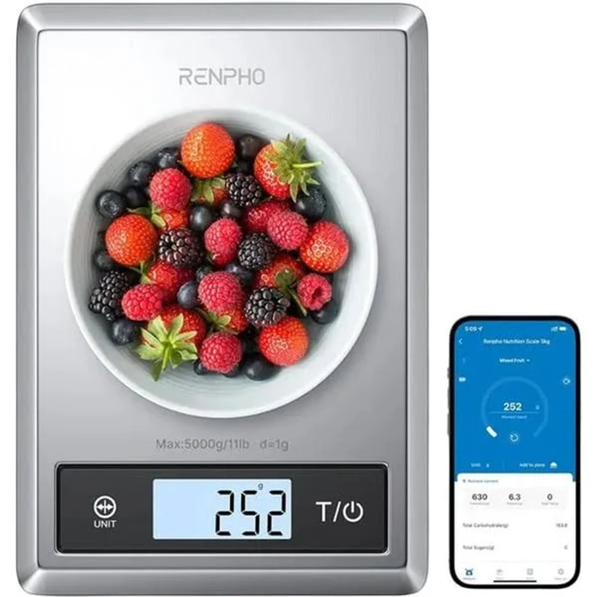 A digital kitchen scale with mixed berries in a bowl and a phone showing nutritional info.