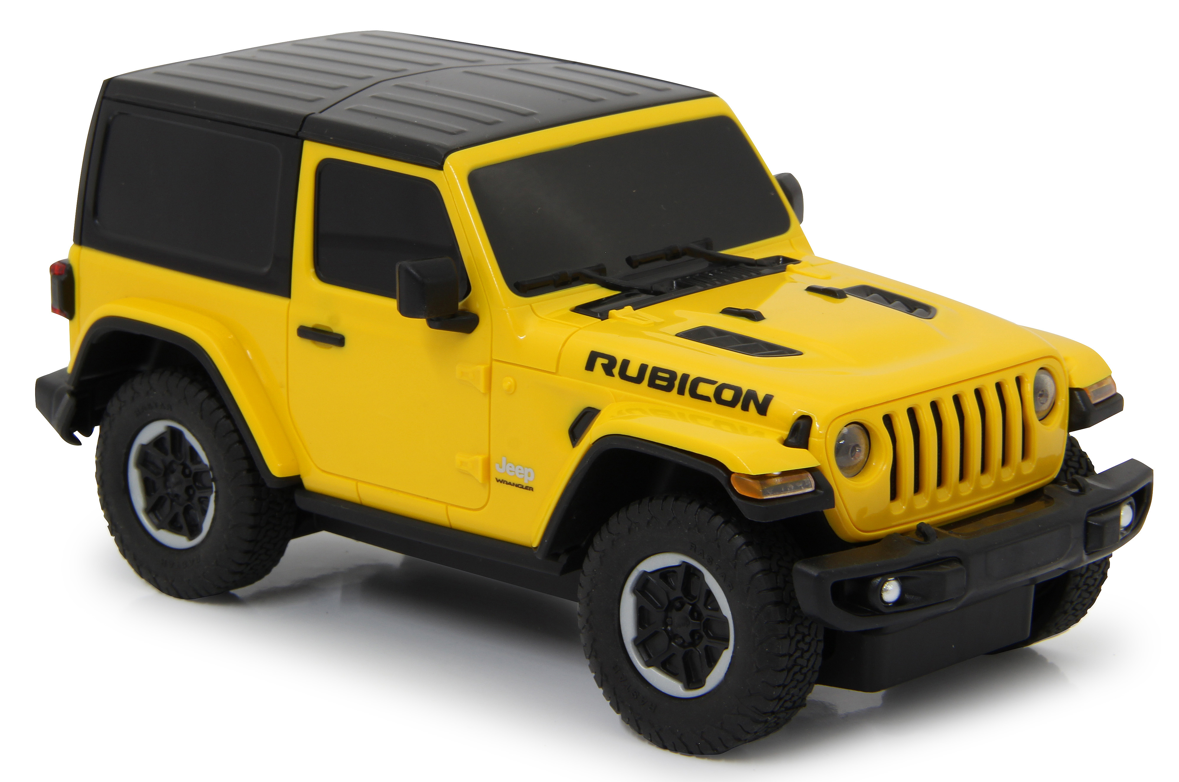Gelber Jeep Wrangler Spielzeugauto mit schwarzem Dach. Das Auto steht auf weißem Grund, Nahaufnahme.