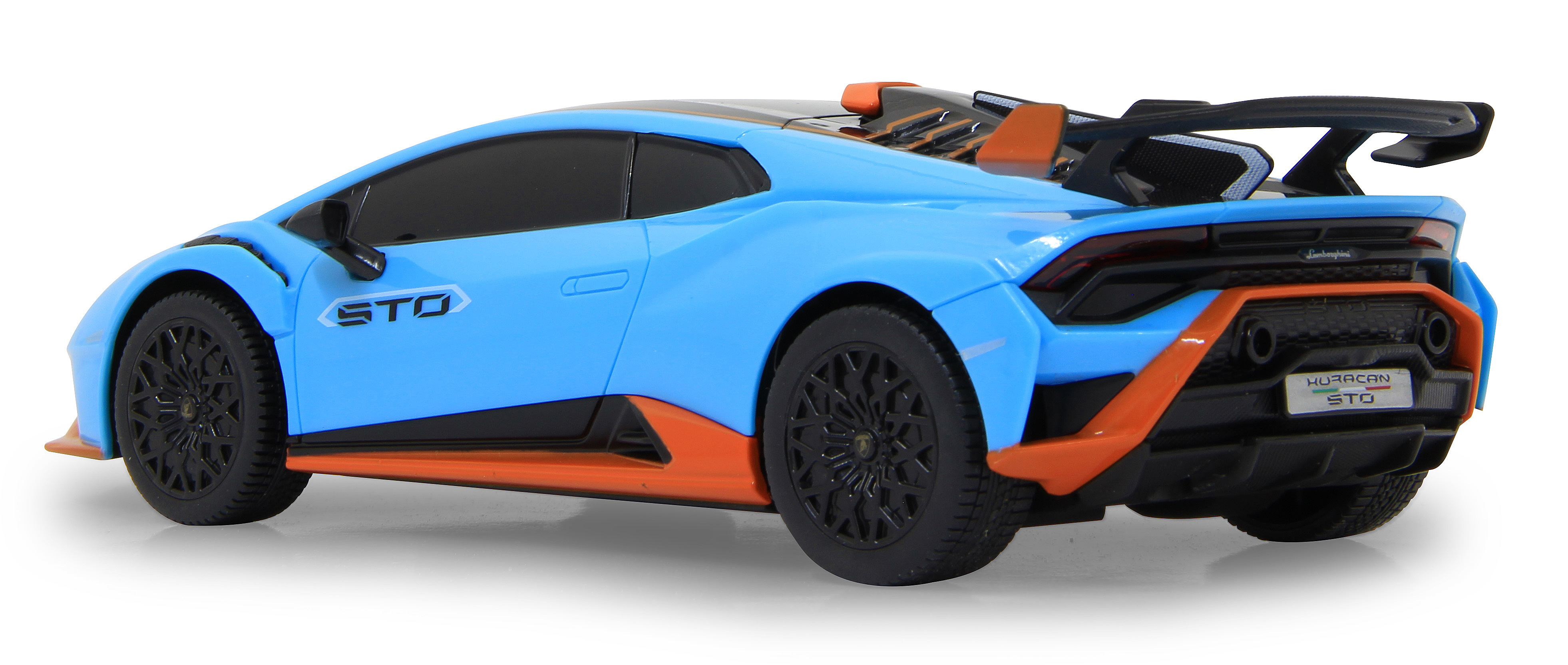 Schwarze Fernbedienung mit goldenem Lamborghini-Logo. Die Fernbedienung hat zwei Steuerknüppel und eine Taste.