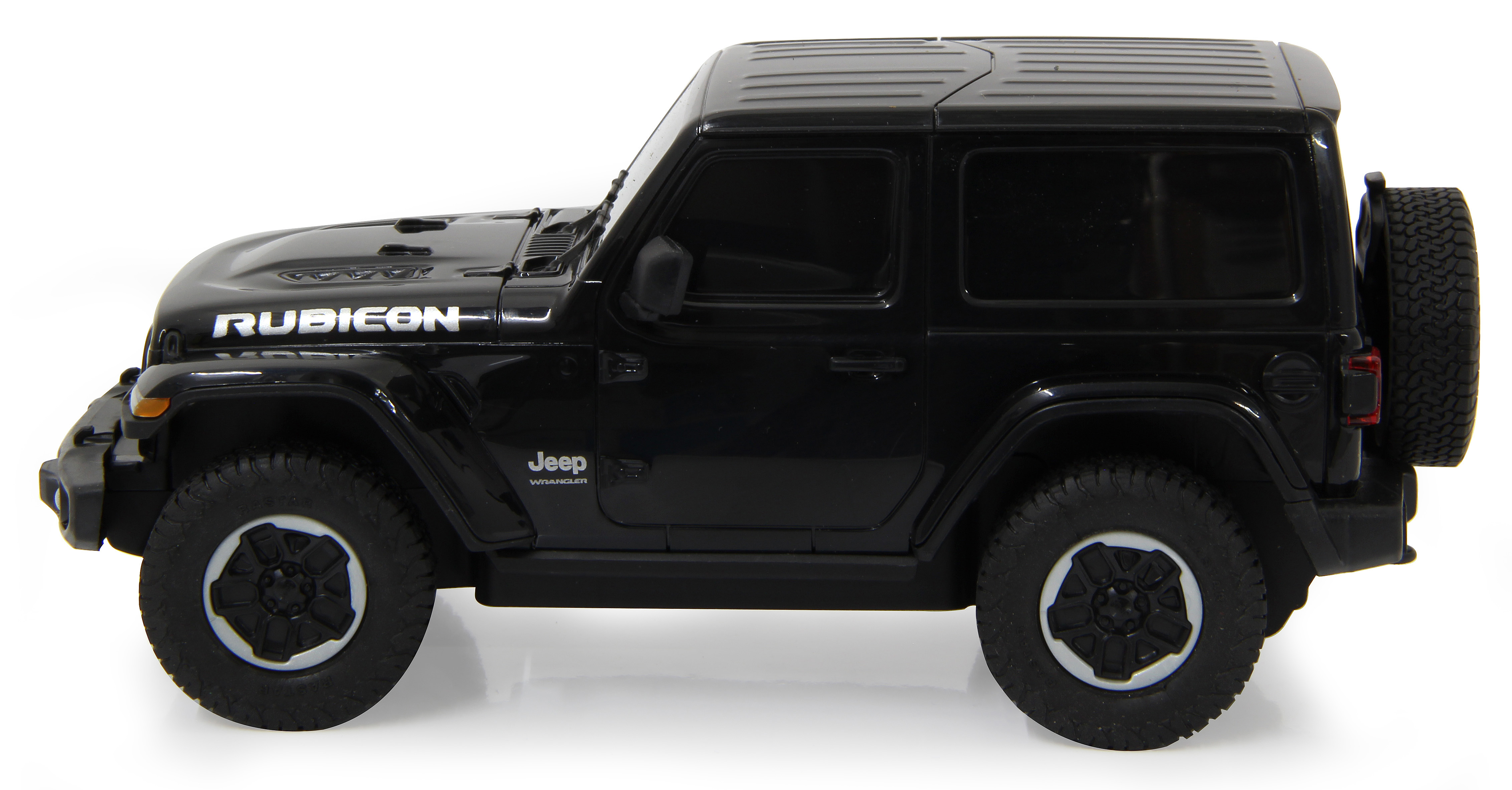 Ein schwarzes Jeep Rubicon Spielzeugauto von der Seite betrachtet. Es hat ein schwarzes Dach und ein Ersatzrad hinten.