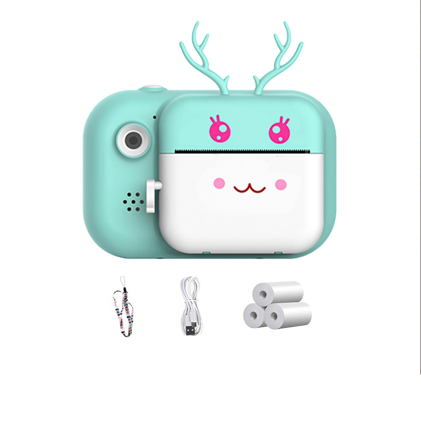 Eine türkisblaue Kamera mit Hirschdesign. Sie hat Zubehör wie einen Riemen, ein USB-Kabel und Papierrollen.