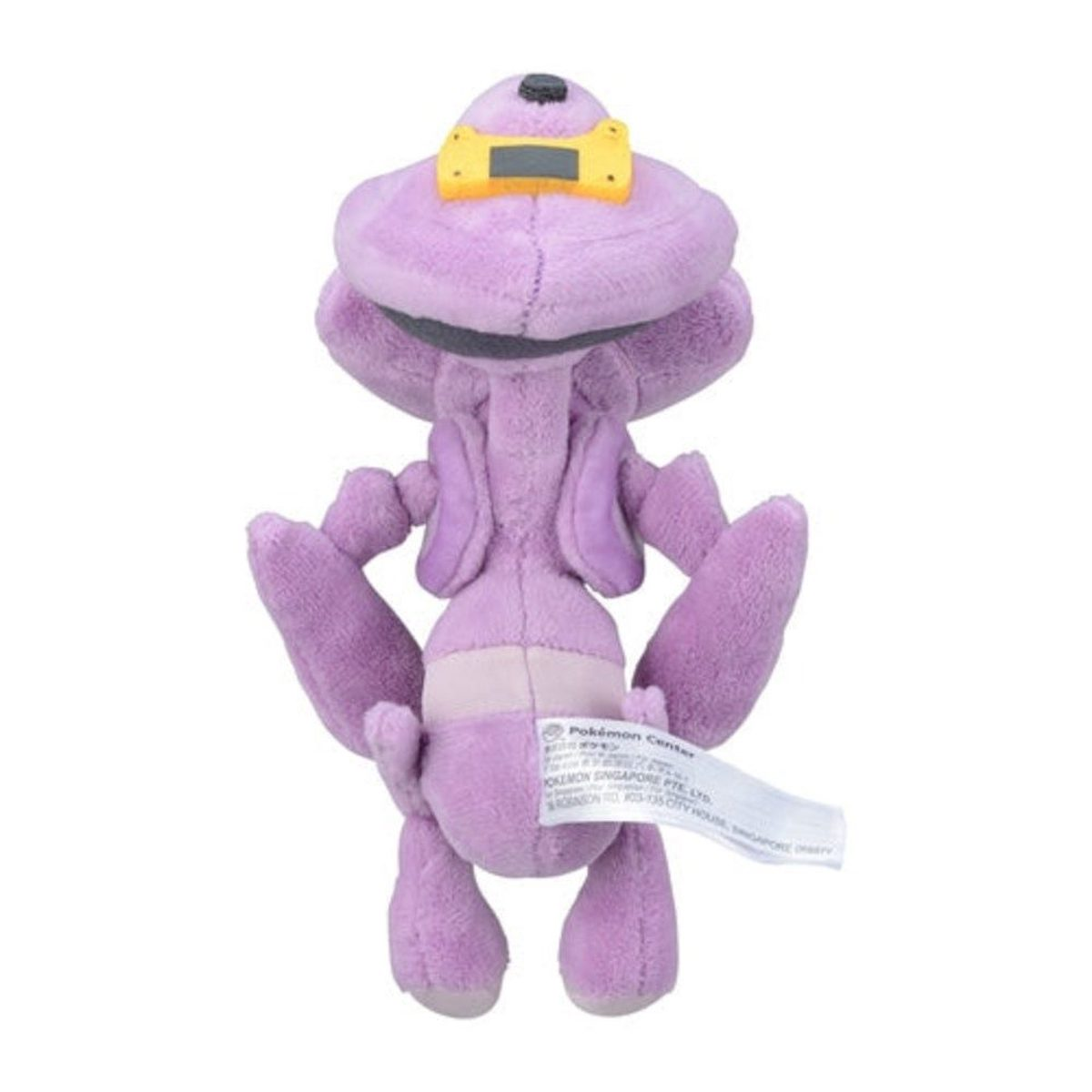 Ein lila Plüschtier mit gelbem Kopfschmuck und Armen hinter dem Rücken. Es ist ein Pokémon.