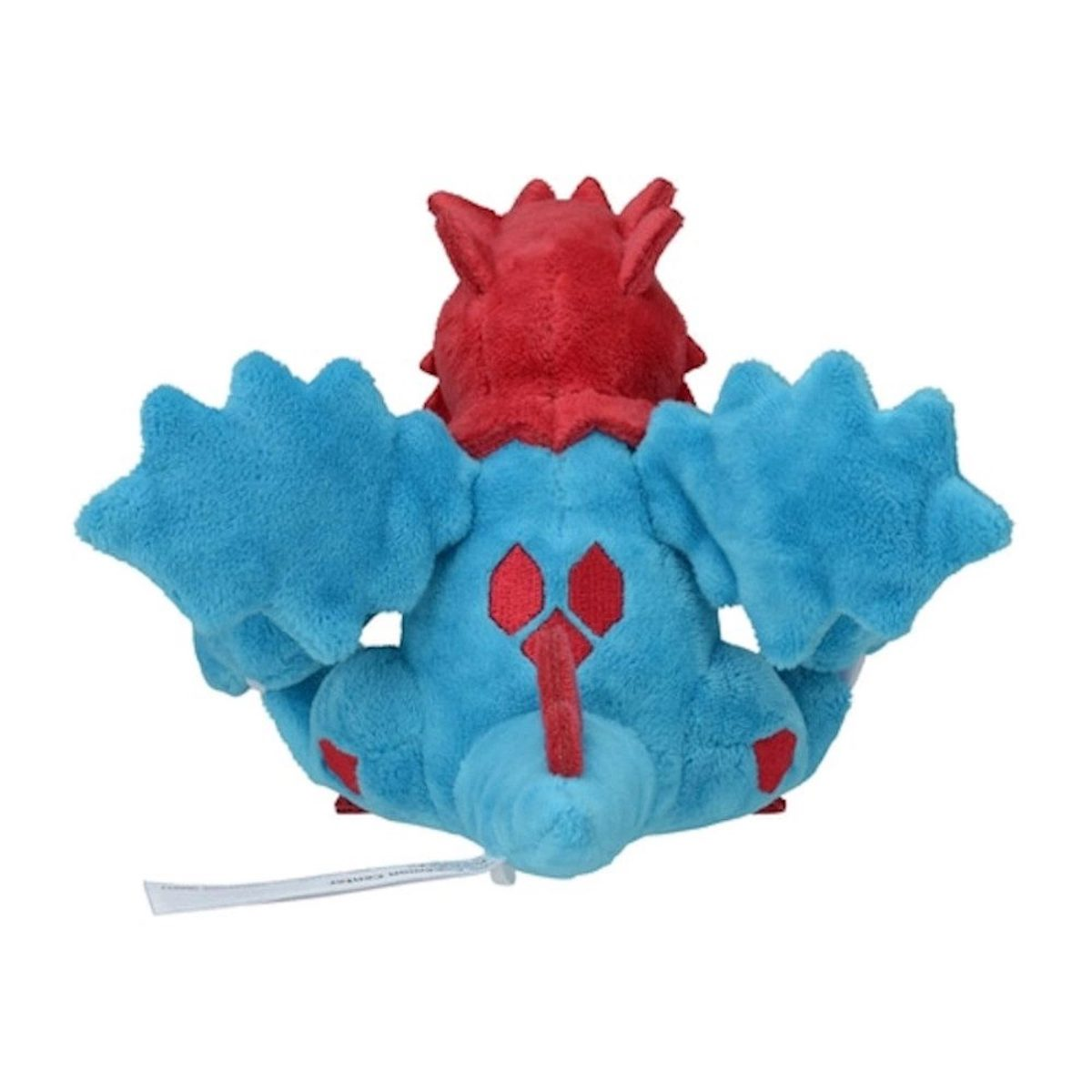 Blau-rotes Plüschtier von hinten. Es hat blaue Arme und einen roten Kopf.