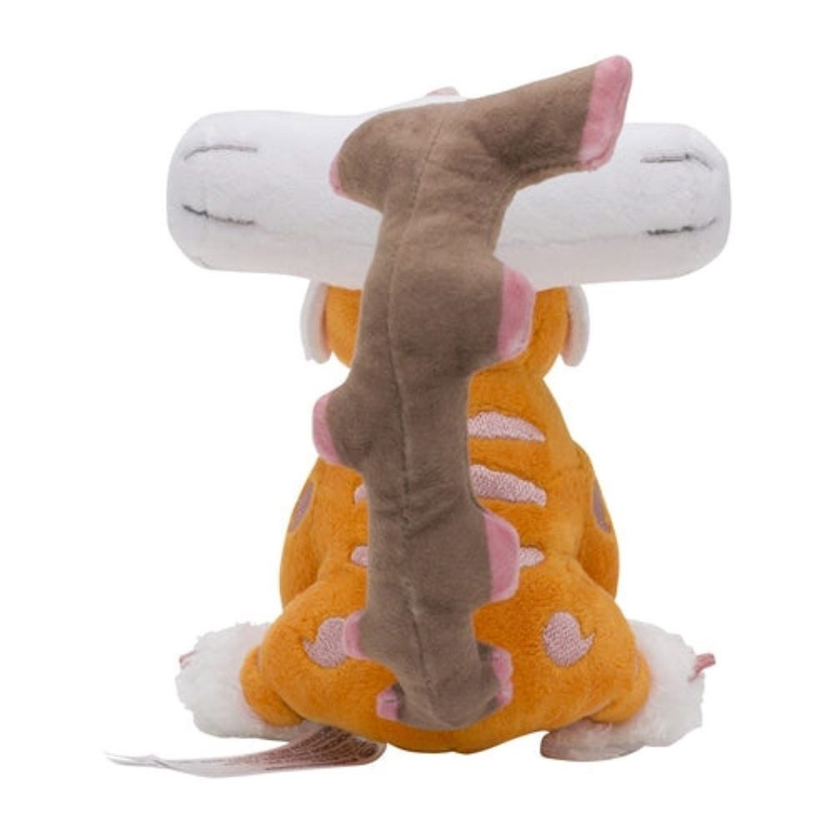 Ein orangefarbenes Plüschtier mit weißer Maske und Wolke, von hinten, mit braunem Schwanz.