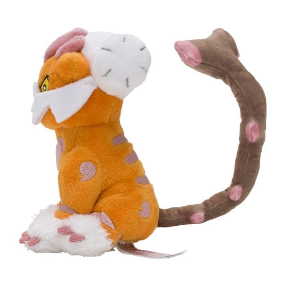 Ein orangefarbenes Plüschtier mit weißer Maske, Wolke und rosa Flecken, seitlich, mit braunem Schwanz.
