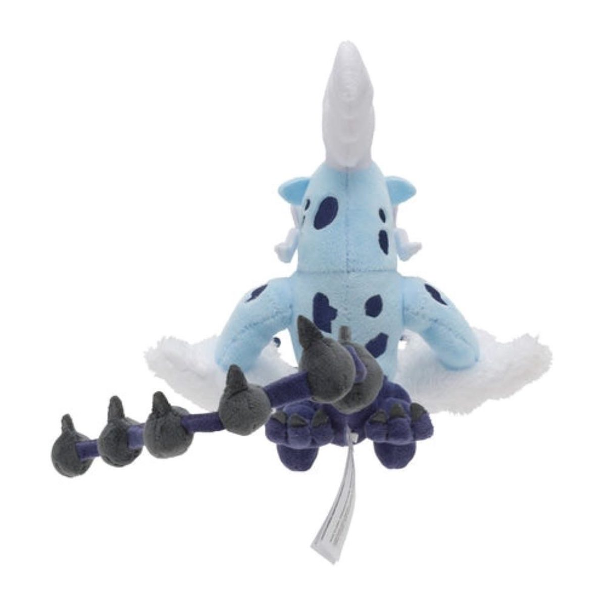Ein hellblaues Plüschtier mit weißem Fell, blauen Flecken und dunklem Schwanz mit schwarzen Stacheln.