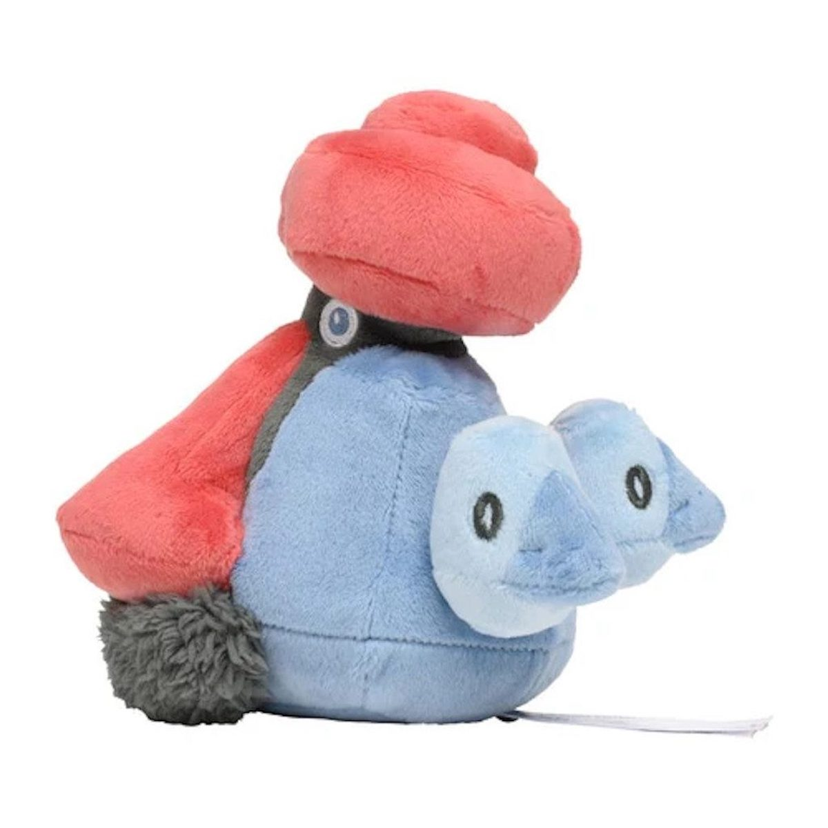 Ein Pokemon-Plüschtier mit rotem Kopf, blauem Körper und grauen Akzenten.