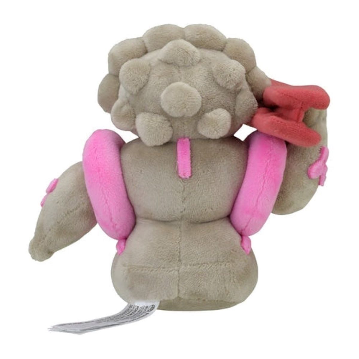 Ein Plüschtier eines Charakters mit beigem Körper, rosa Akzenten und einer roten Hand, von hinten.