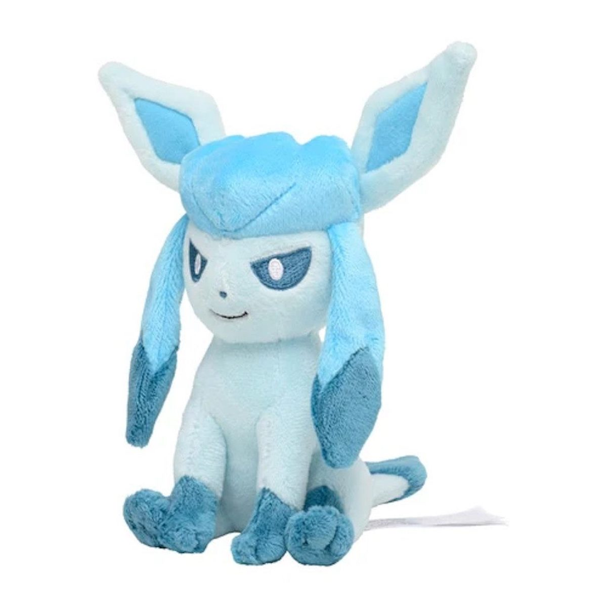 Ein blaues Plüsch Glaceon Pokémon Spielzeug mit großen Ohren und einem fröhlichen Gesichtsausdruck, sitzend.