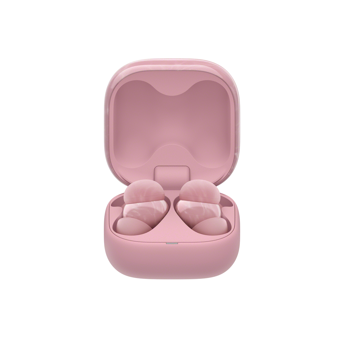 Due auricolari rosa all'interno di una custodia di ricarica rosa aperta.