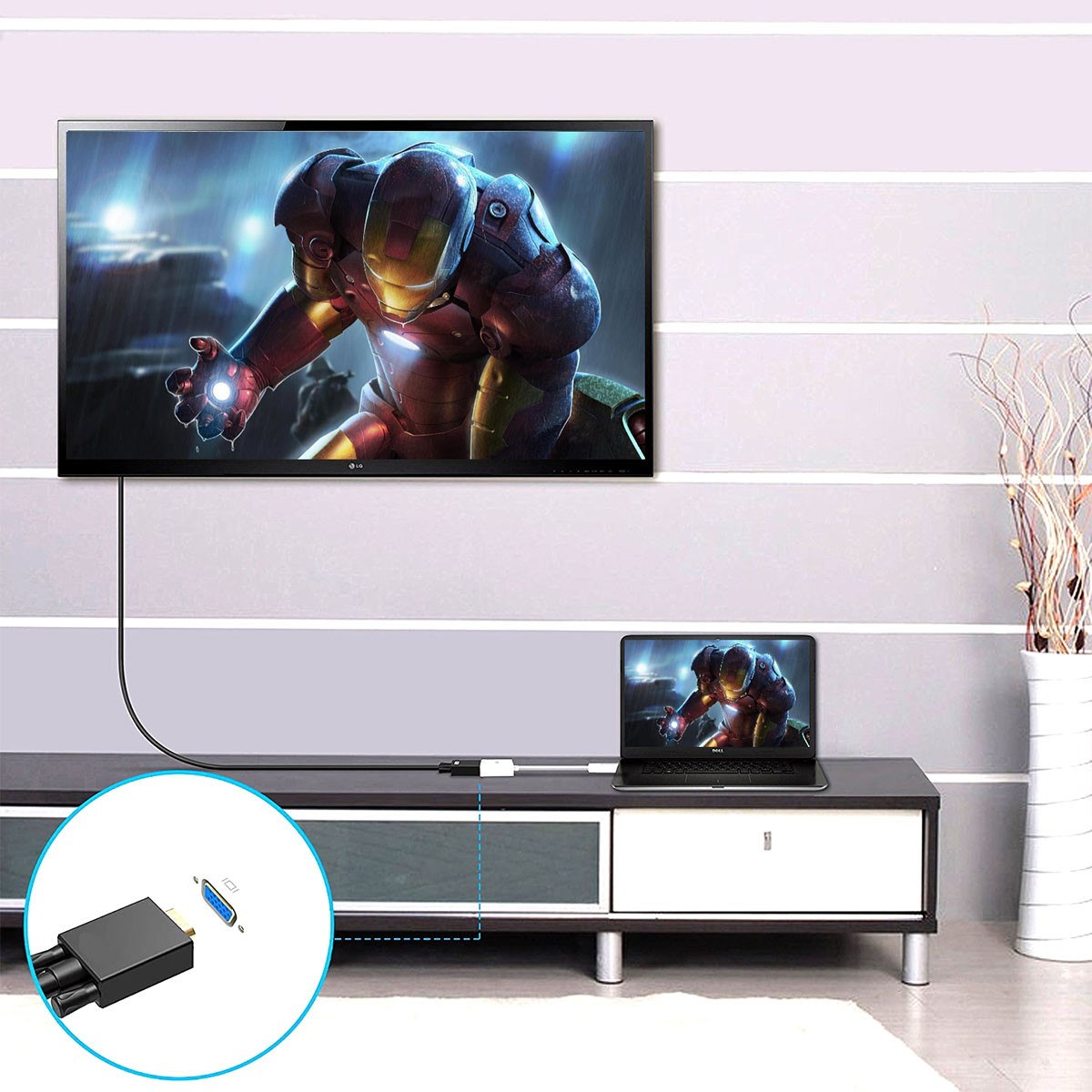 Una TV e un laptop collegati con cavi, primo piano dei connettori.