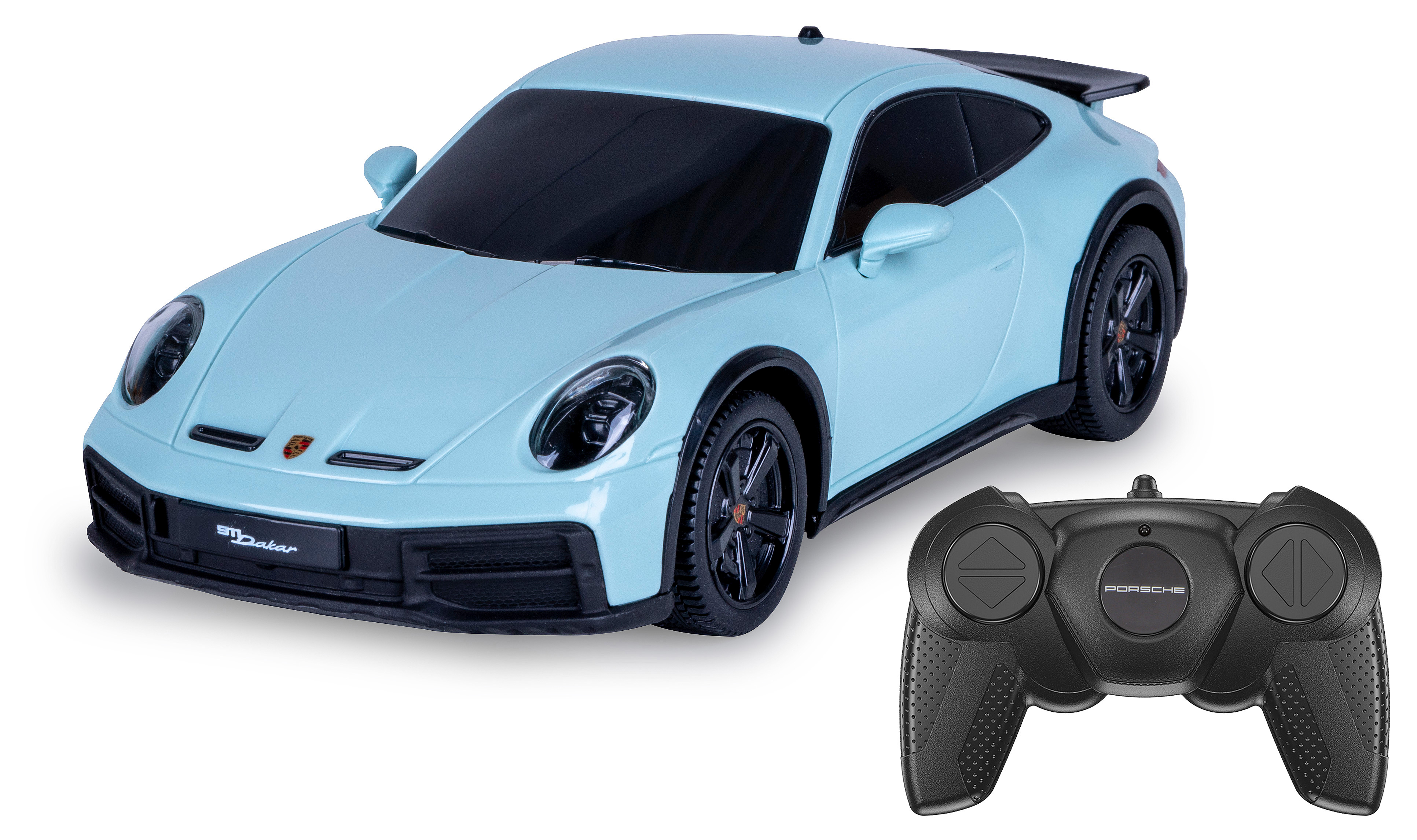 Ein hellblaues Spielzeugauto und eine Fernbedienung, ein Porsche 911 Dakar Modell, auf weißer Oberfläche.